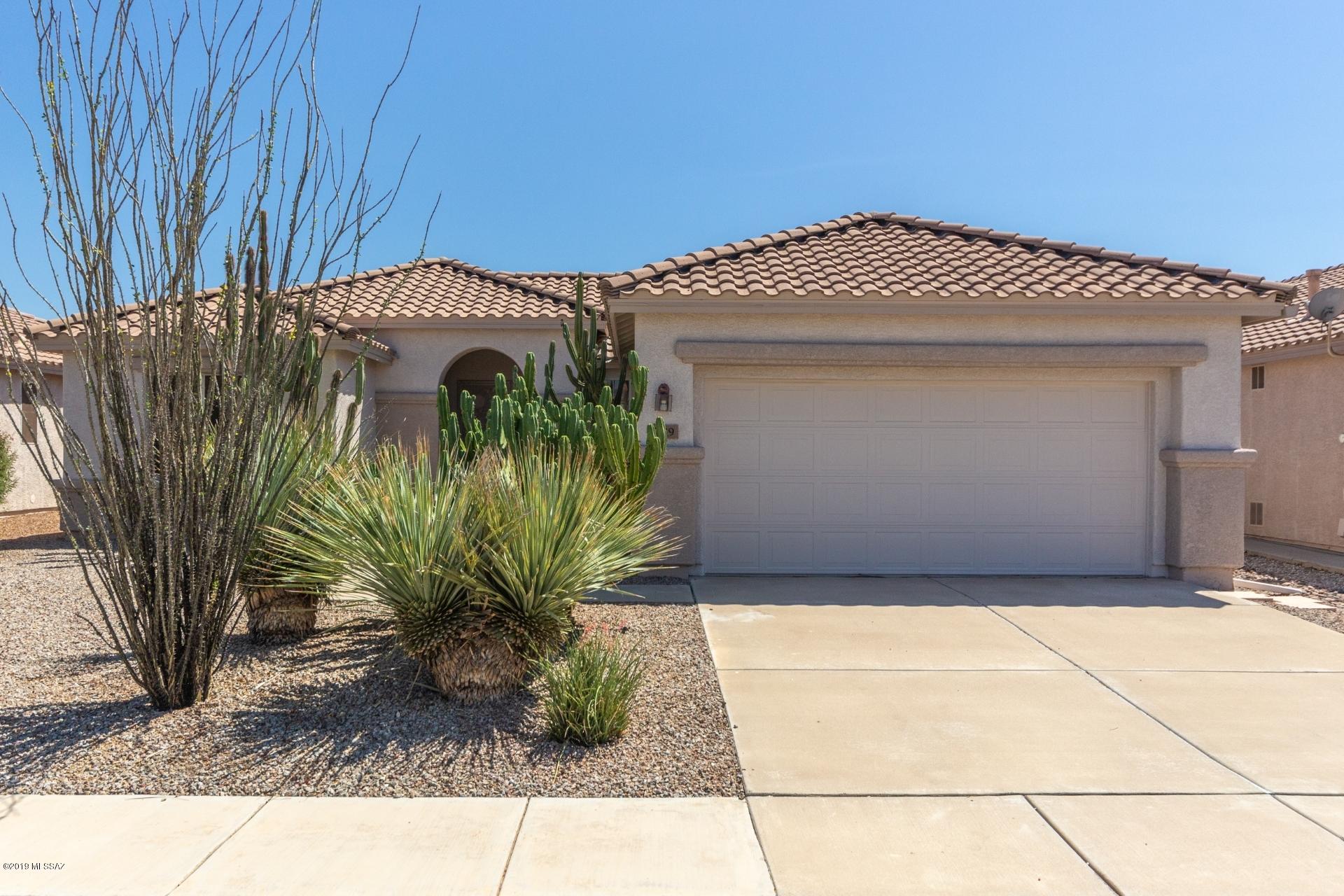 Clean and well kept describes this San Marcos model in the wonderful Sunflower Community. Recently painted inside and out.  The plantation shutters throughout open up to a beautiful bright home.  Large format tile floors everywhere but bedrooms which have new carpeting.  Move in ready.  Upgraded contemporary ceiling fans.