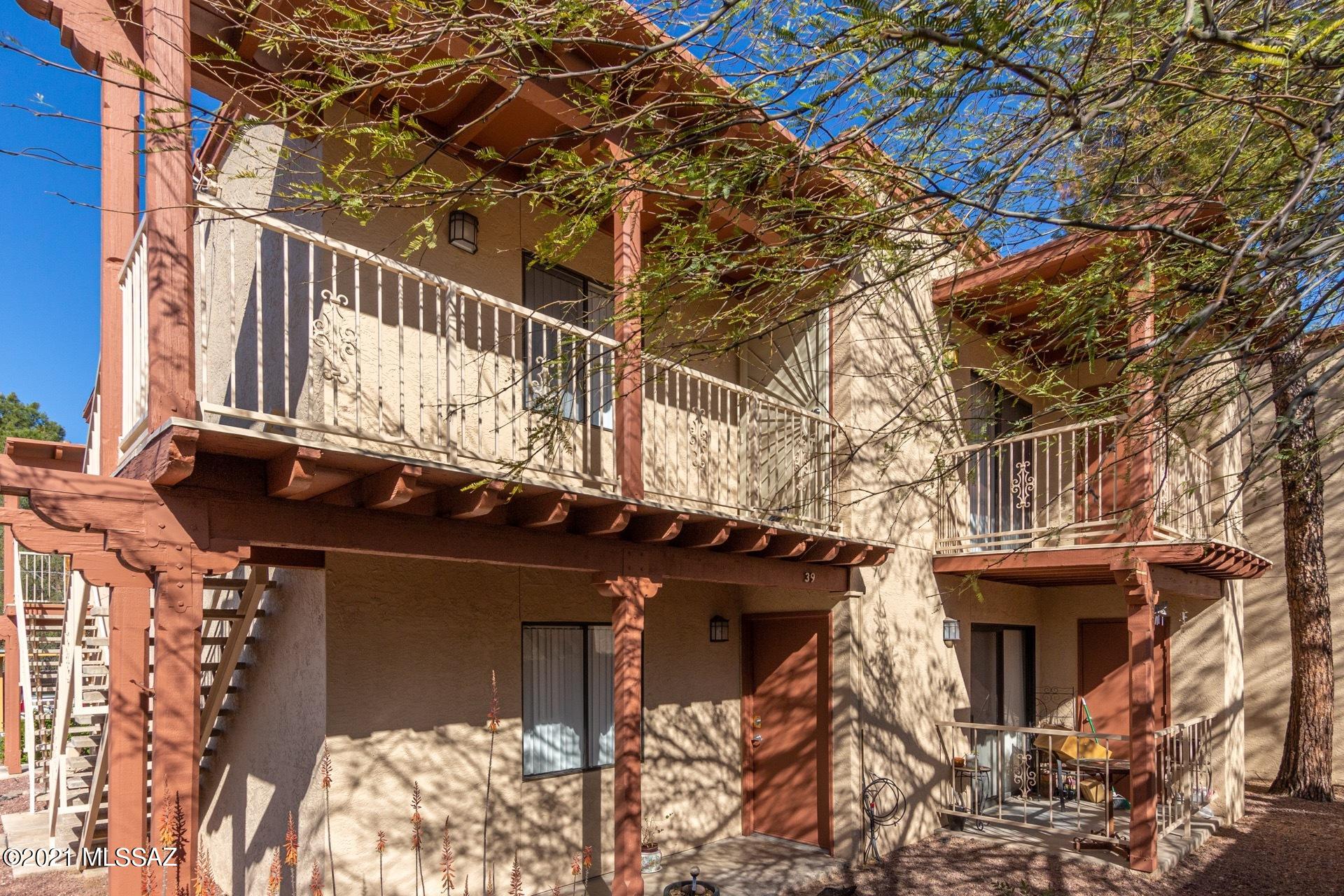 Must See!! Won't last long.. Gorgeously updated condo with 1 year old HVAC Seer 14 and new engineered wood flooring throughout the main living areas. Spacious split floor plan with lots of storage. Secluded in the rear portion of the community providing privacy. Cherry wood colored kitchen cabinets with granite countertops, and newer black appliances. Full size clothes washer and dryer located in hallway. Patio deck with storage closet that overlooks a mature mesquite tree. A perfect patio to enjoy your morning coffee, listen to the birds chirp in this hidden mid-town gem. Covered parking space located right at the bottom of the entry stairs, spot #40. Fabulous community courtyard nicely landscaped with pool and spa. All offers will be reviewed by Seller on Monday 3/29 @ 5:00 pm.
