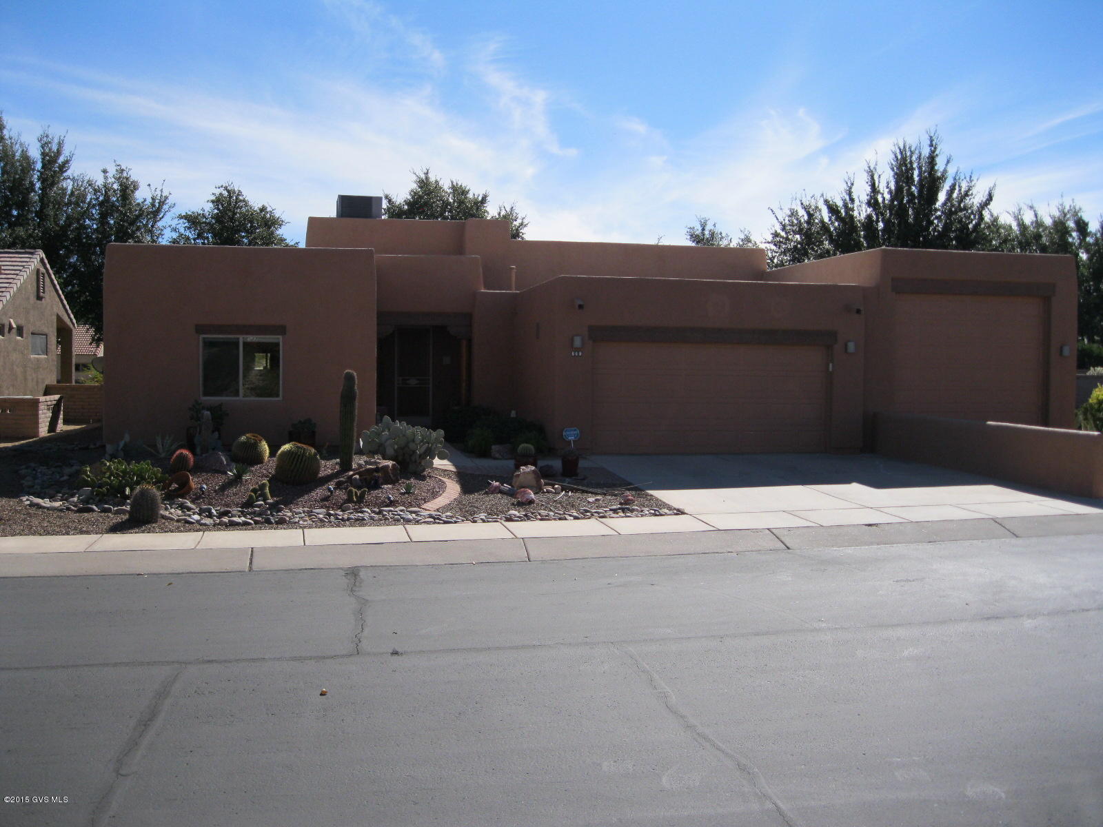 This beautifully updated home is move-in ready and has many great features. This two bedroom, two bath home also has a den plus an extra office space for whatever your needs may be. Enjoy the convenience of central vac. New windows 2011, new HVAC 2014, exterior paint and roof re-coat in 2012 and new hot water heater & pump in 2014 are just a few things that make this home well maintained. Beautiful landscaping with electric sun shades on the back patio, built in BBQ with refrigerator and wine cooler and a gas fire pit making this home great for entertaining. Even if you don't have a motor home enjoy the extra space for storage and a workshop. This home backs up to the greenbelt and offers a partial mountain view. Don't miss the Visual Tour.