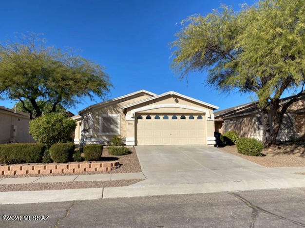 This Home is full of Upgrades, Energy Efficient and Security Features! 4 Bedroom Split Floor Plan. Large Open Great Room with Surround Sound and Ready for Your Wall Mount TV. Master Suite with Walk-in Closet. Master Bath with Dual Sink Vanity, Soaking Tub and Separate Shower. Triple Pane Windows, Solar Screens, Ceiling Fans and Tile Flooring throughout. Carpet in Bedrooms. Wired Ethernet Network and Coax in every room. Security System installed including Monitored Smoke Detector. Large Rear Patio and Beautiful Landscaped Backyard with Lush Green Grass. Good Credit and Background Required.
