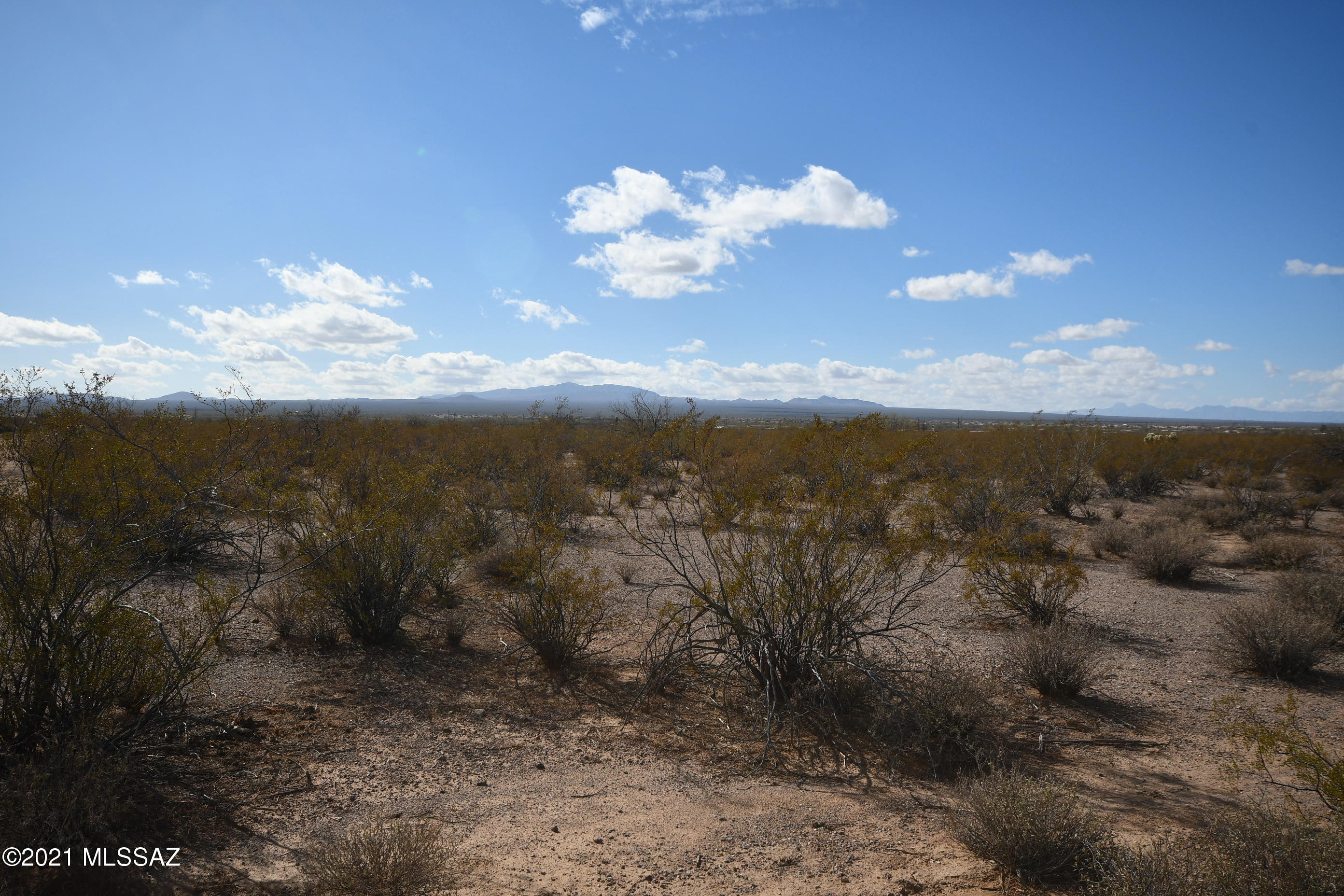 A very rare find and terrific opportunity! First time offered, perfect for mini-ranch with country feeling only a few miles to downtown, shopping and casino. Area of custom homes however manufactured homes allowed per sensible deed restrictions. No HOA, easy build land, panoramic views, horses allowed. Property served by shared water well and TRICO electric. Dividable GR1 zoned property. Additional parcels available up to 32+- acres. Seller finance possible.