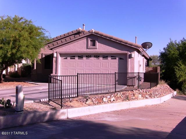 Home will be available for move in on 5/20/17.

The Gorgeous Home is located in the highly sought after Dove Mountain Community. This 4 Bedroom 2 Bath home has numerous upgrades including upgraded kitchen cabinets, 18 inch tiled floors, Corian counter tops as well as upgraded carpet. Open floor plan & split bedrooms for additional privacy. Covered patio with a grassy play area and a swimming pool for cooling off in the blissful AZ heat. Corner lot has lots of privacy. Home comes with an alarm system for tenant activation at tenants expense. Call to schedule an appointment.