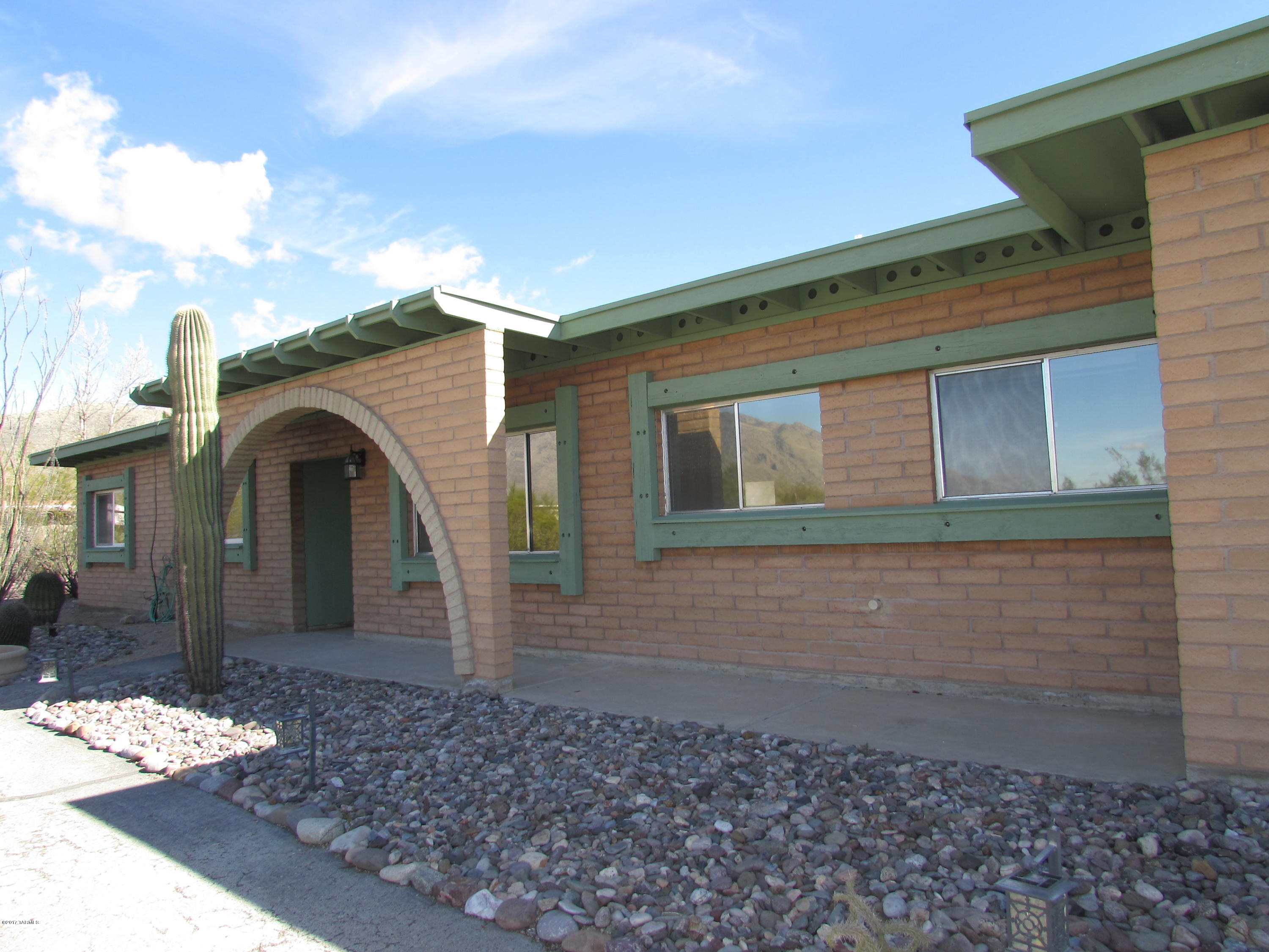 Outstanding views from inside and outside.  Bright and light interior with amazing kitchen with lots of cabinets and counter space and a huge island.  Great Room has a wall of glass facing the sparkling pool and mountains.  Guest quarters has a separate entrance and wall A/C.  This property has great appeal.