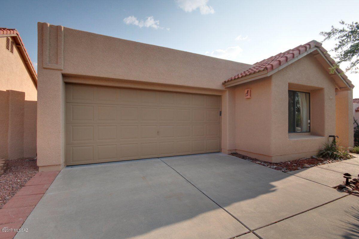 Amazing view of Pusch Ridge. Privately situated patio home with exceptional Pusch Ridge views & convenient to all Tucson and Oro Valley has to offer. Open light great room w/ upgraded tile floors, all new Interior and Exterior Paint, New Carpet, New Oil-rubbed Bronze door hardware and fixtures, Newer Craftsmade Cabinetry in kitchen with Corian Countertops. Eat-in kit has  corner window with great views, Breakfast Bar & access to yd. 2br-2ba split plan for added guest privacy! Delightful flagstone patio w/ built-in BBQ & mature vegetation. Epoxy coated 2-car garage w/ storage, long driveway and cul-de-sac give additional parking! All upgraded appliances stay! Well maintained and move-in ready. Owner/Agent