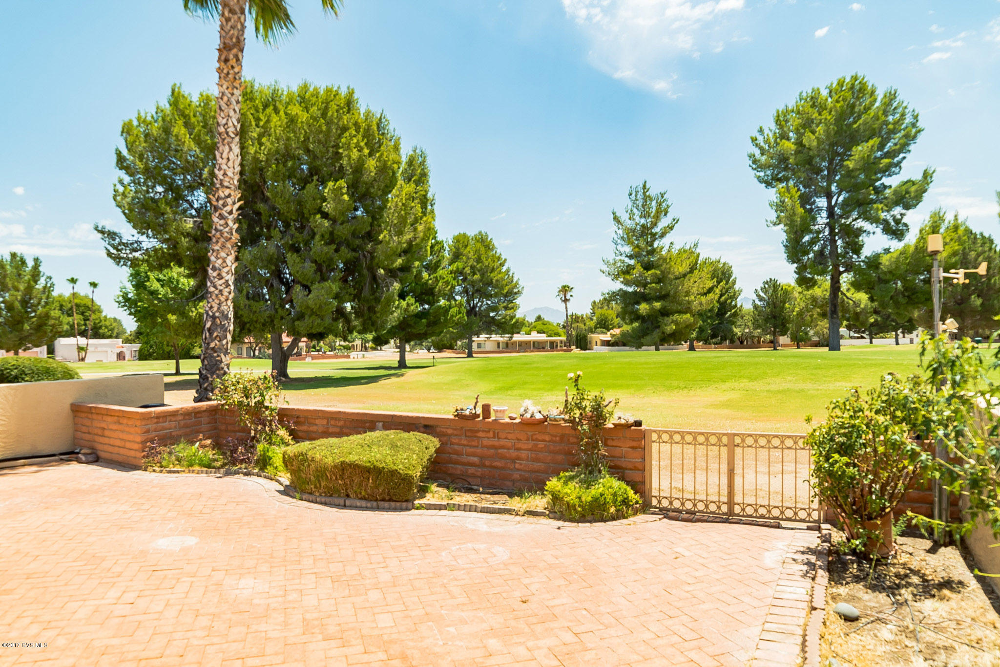 Situated on the golf course, this special home offers a view of the green fairways as far as the eye can see. Inside you'll find a very livable floor plan that can become your winter retreat or a year-round home. A fireplace in the living room area will take the chill off a cold winter's night. There are 2 bedrooms and baths, a galley style kitchen, dining area and a wall of windows that bring the light streaming into the main living areas. Step in back to a gorgeous view of the green golf course and you'll be ready to make it yours. Easy care landscaping means you'll have plenty of time to enjoy all the amenities that Green Valley offers.
