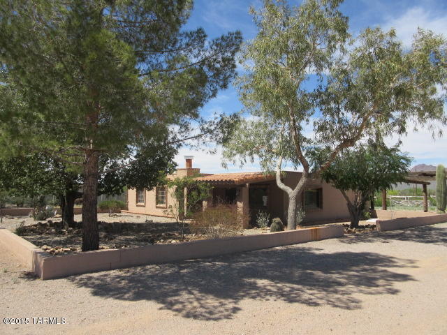 Great find.  Big 2 bedroom / 2 bathroom house on a large 4.6 acre lot.  Inside you will also find a large living room with a fireplace, a large kitchen, a dinning area with a fireplace and large master bedroom.  Outside there is lots of flat usable land for the new owner to take advantage of and a large storage building that can be used for storage, hay storage or workshop.  Folks don't let this one get away.