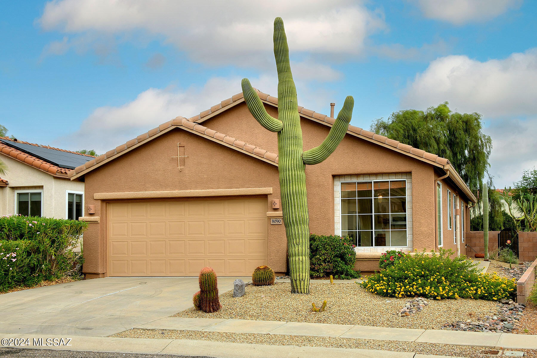 Sellers are motivated! Preferred 3 bd floor plan in the premier 55+ Active Adult Community of Sunflower.  Freshly painted interior w/ Rogo's stained concrete floors in all common areas for appealing, low maintenance living.  Great room offers a gas fireplace & opens to dining room for entertaining & an uninterrupted flow in the floor plan.  Walk out your sliding glass door onto the extended patio that's fully screened-in & perfect for your up close mountain view over morning coffee. Split bedroom design offers a large primary w/ spacious walk-in closet.  Primary bath w/ enormous custom walk-in shower that's handicap accessible.  Second bedroom doubles as an office space with a beautiful Murphy bed &  built-ins.  Sturdy built-in cabinets in garage for extra storage. Plumbed for soft water.