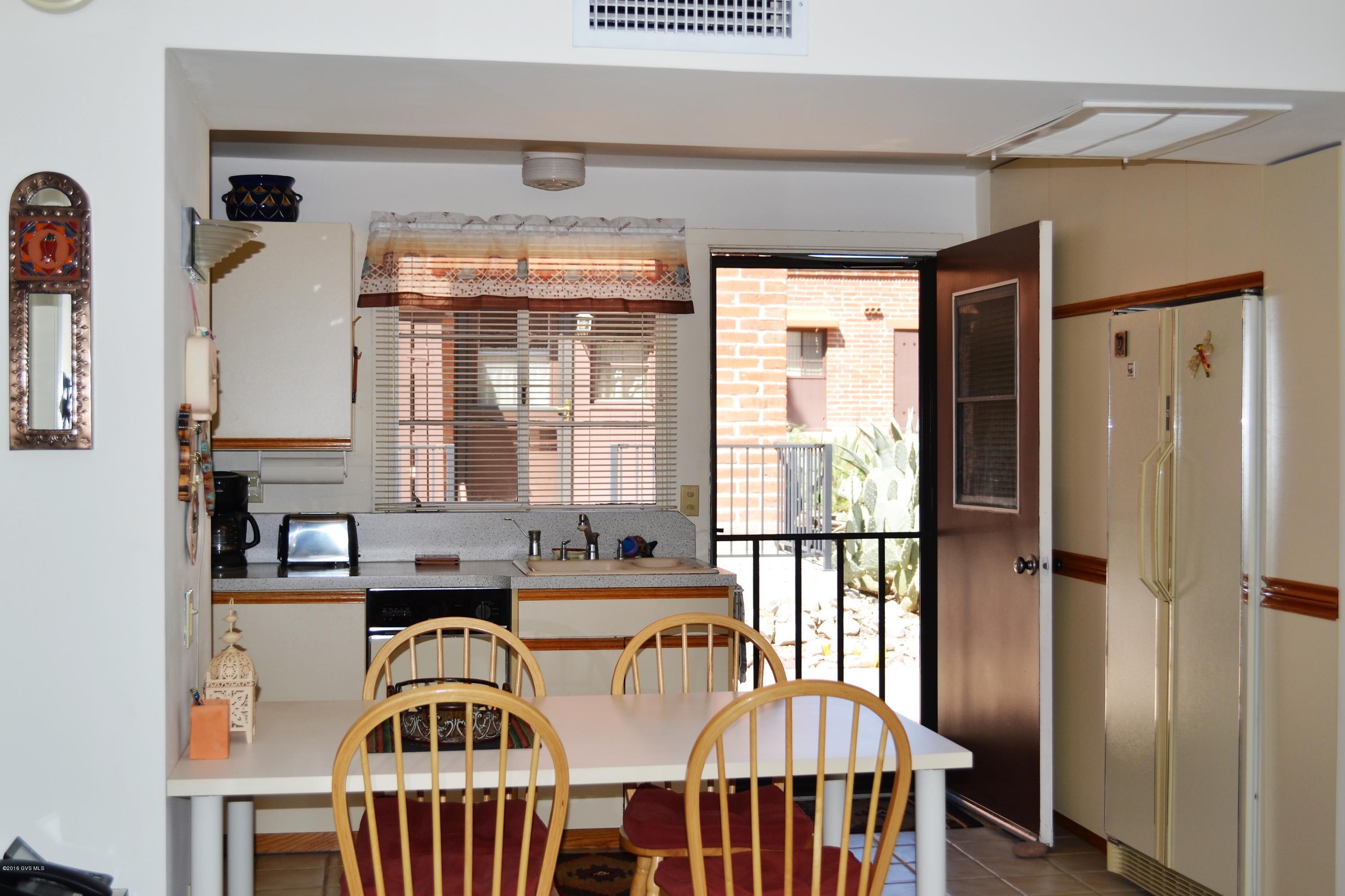 Beautifully furnished condo, ready to move into or use as a vacation home or investment property. Features full sized side by side refrigerator, gas range, dishwasher, microwave, garbage disposal, queen sized sofa sleeper, and much more. Neighborhood offers 4 heated pools, park areas, putting greens, shuffle board, and laundry facilities.