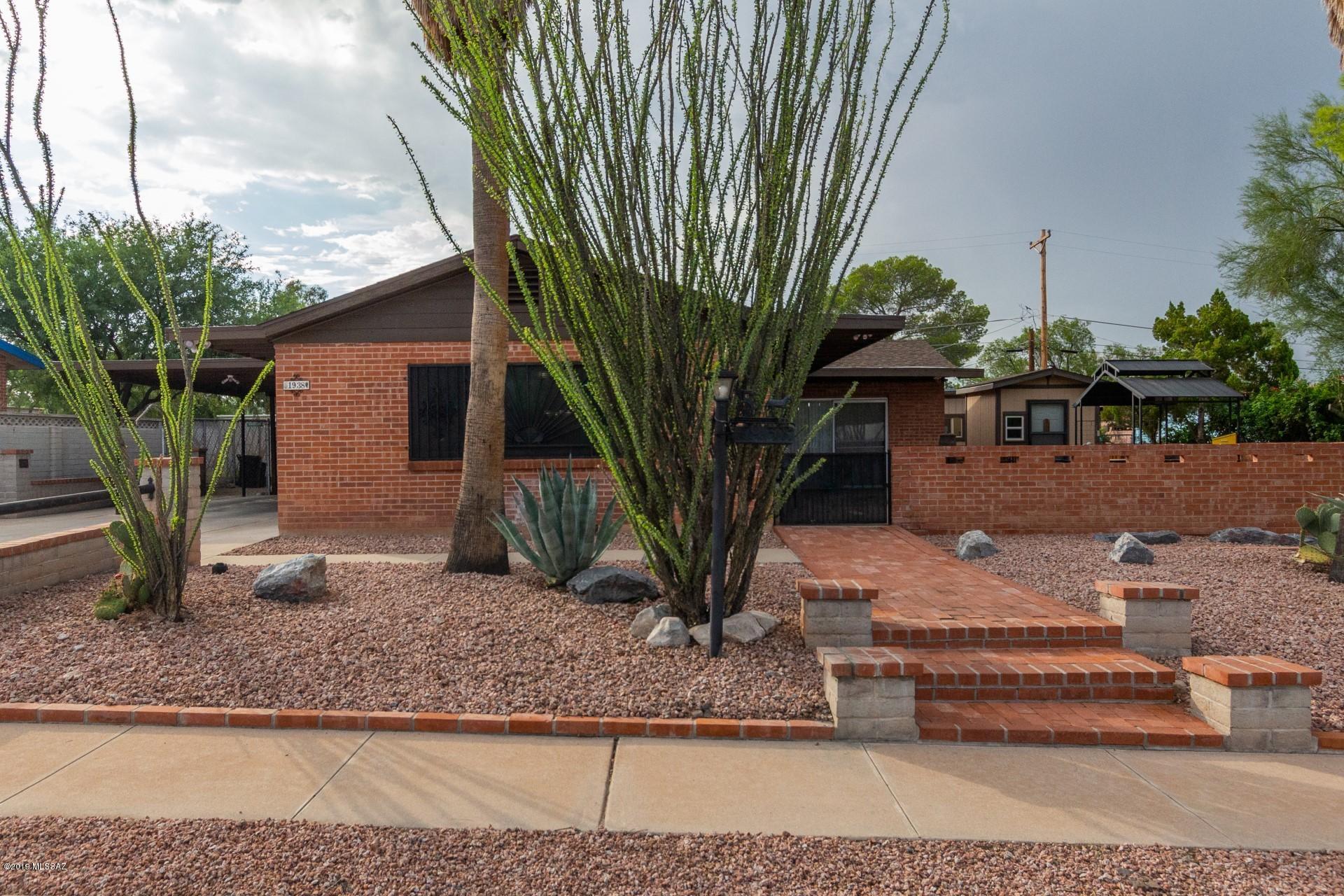 A MUST SEE!! This beautiful ranch-style home with brick construction is nestled in the gorgeous and
wonderful Desert Hills subdivision. This home has all your needs and a perfect family home with lots of character and charm. A large and
spacious living room to entertain guest. The open floor plan gives you the ability to entertain while dining in peace! Kitchen has been
updated with new countertops, backsplash and brand new appliances. The gorgeous and spacious bedrooms have been updated with brand
new, wood like flooring. A long driveway gives you plenty of space for parking. Newer AC with 10 year warranty and new roof with 25 year
warranty. The gorgeous patio area is PERFECT for parties and cookouts! You'll find yourself treated by many surprises in this yard that
includes a WORKSHOP, Play room and a lean-to shed used for storage. Located withing minutes from Pima College, schools, parks, shopping markets, mountains for hiking and much more!