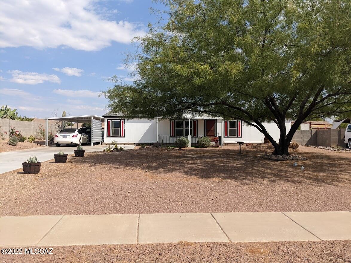 Wow, this is it!  So many upgrades, and done so well.  Beautiful 3 bedroom, 2 bath home, with curb appeal, and set back from the road.  Enter the house, to the living room right off the Master Suite, with walk in closet, and big Master ensuite, with step in shower.  Large open kitchen with new center island, all new appliances, Butcher Block counter tops, peninsula with seating, drawers and  cabinets.  Gas stove, with insulated pantry, and Just off the kitchen is the laundry room and great storage area! Guest bedrooms are on the opposite side of the house, off the dining area, with a door to the Oasis like backyard.  Two covered patio areas, and all the potted plants stay!!  Yard is on drip system, and lighted.  And if that's not enough, there is a 240sf workshop with dedicated 50 amp service!  There is a total of 7 new awnings, the concrete driveway extends all the way to the street, all new dual pane windows throughout the house, new carpet in all the bedrooms!  And...wait for it, it's got solar too, of course it does!!  Folks it doesn't get much better than this!  Seller is motivated to move closer to the grandkids!