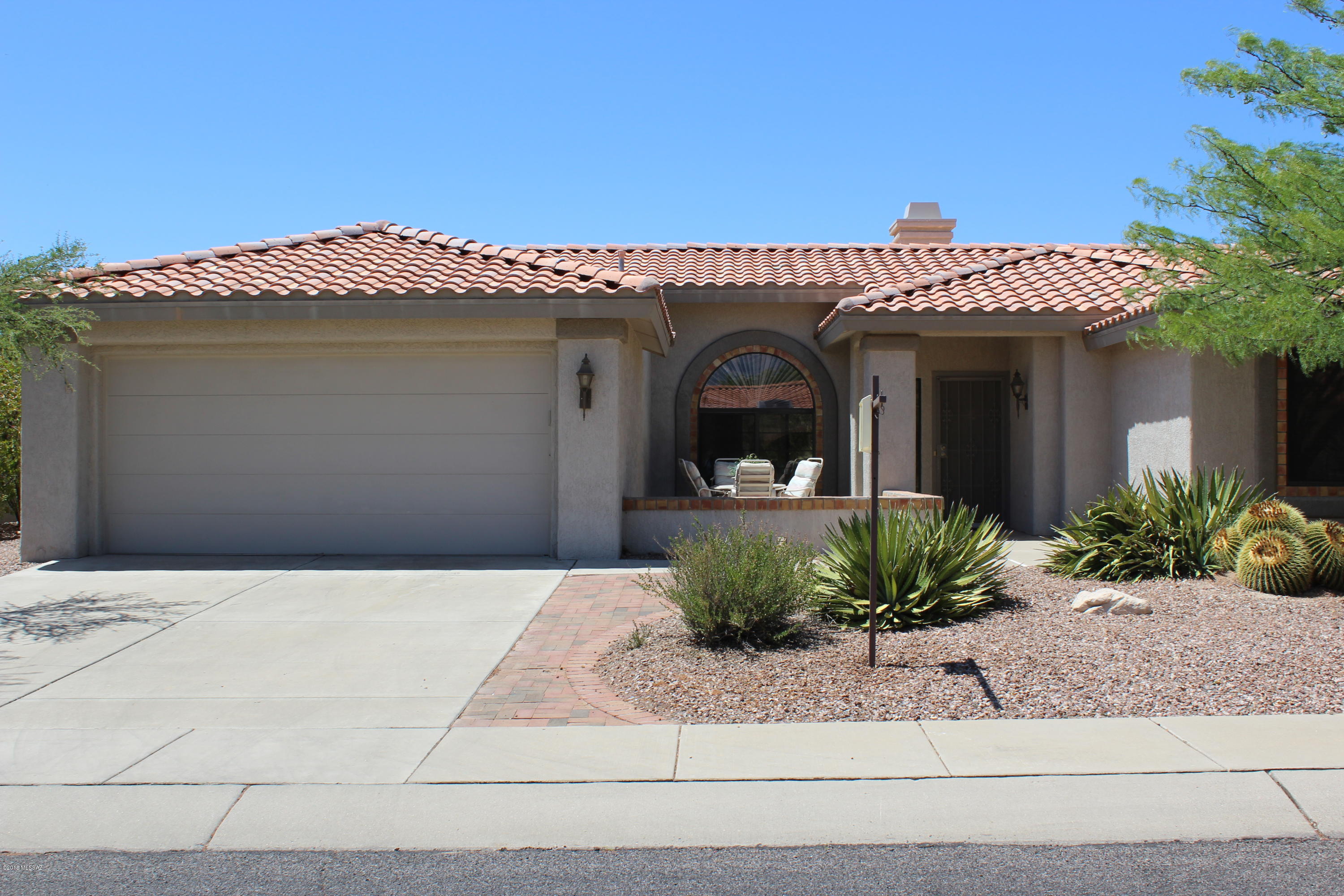 Silvercreek model backs to wash area with views of the Tortolita Mountains from rear patio, kitchen and living area. Catalina Mt. Views from living area and front patio. Clean and move in ready. Kitchen was updated in 2013. HVAC was replaced in August 2013. This home has the small office area off the kitchen, washer and dryer are in the garage.