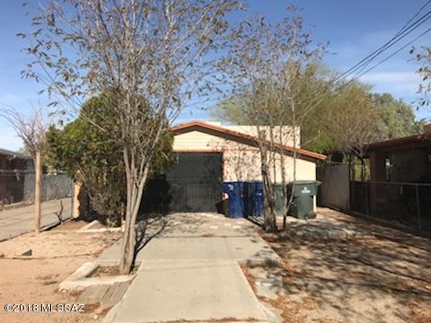 Home needs tlc stores and schools and transportation close by .live in one and rent one unit.