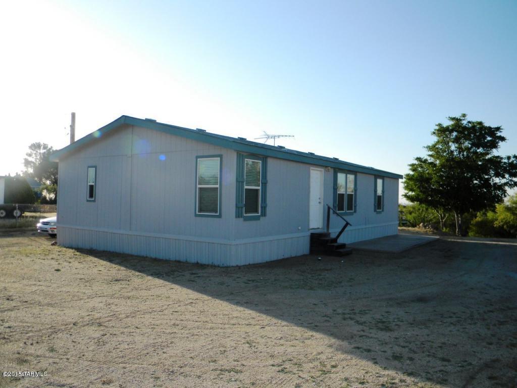 GREAT PRICE for 3 bedroom 2 bath home in the beautiful town of Oracle. Elevation is approx. 4368 ft., about 30 minutes to Tucson. Central A/C and heating, water softener, vaulted ceiling, walk-in closets in all the bedrooms, dual-pane windows, upgraded electric service panel. Flat and usable .33 of an acre, good views. Horses allowed.