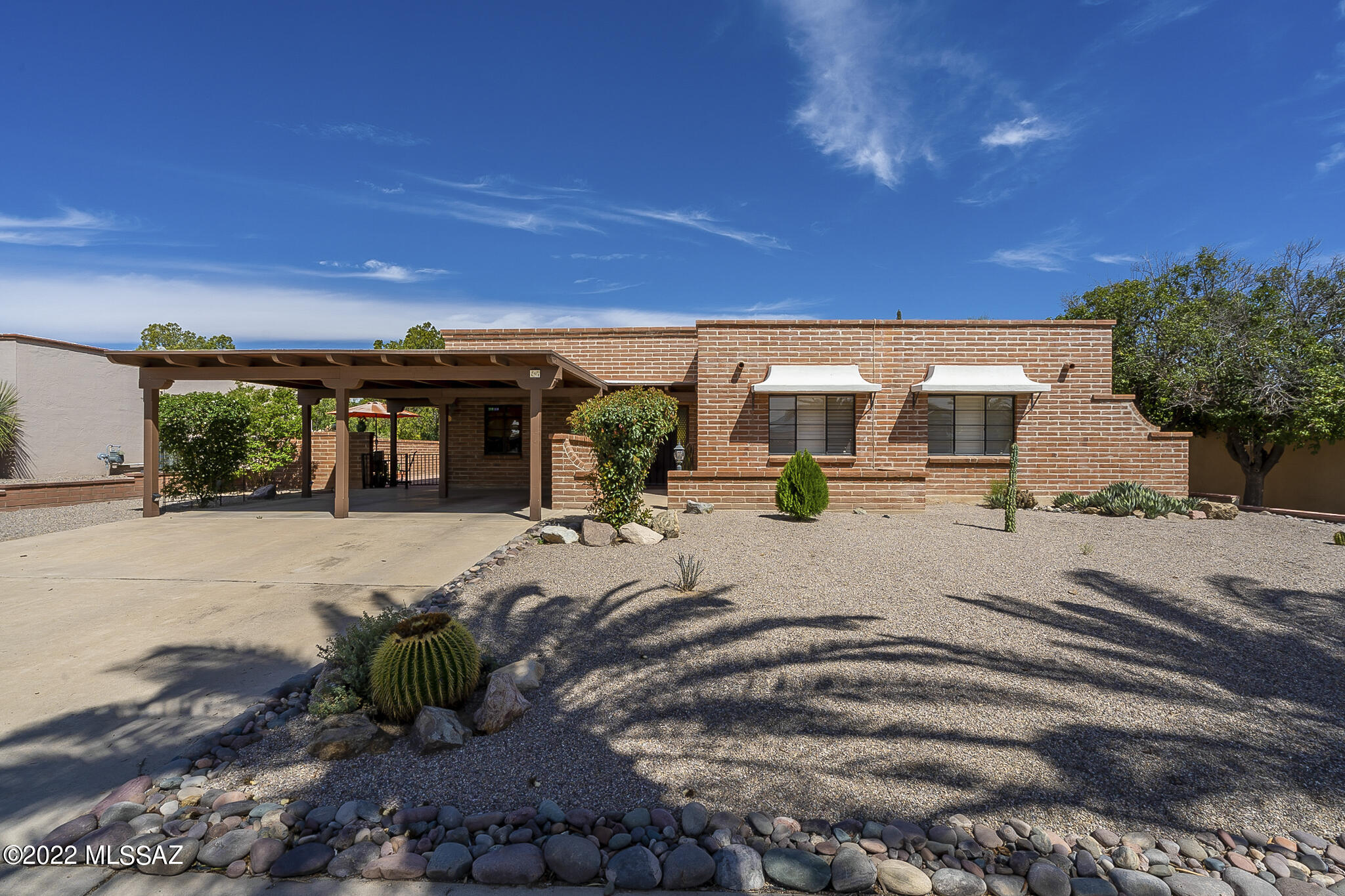 This home has the easy feel of design as intended by the archetect. It flows gently from one spacious room to another with light  and style.  The covered outdoor living space remains unmolested by poorly designed additions.  This is a gracous home, well maintained, private, located in one of the most coved communities in Green Valley.