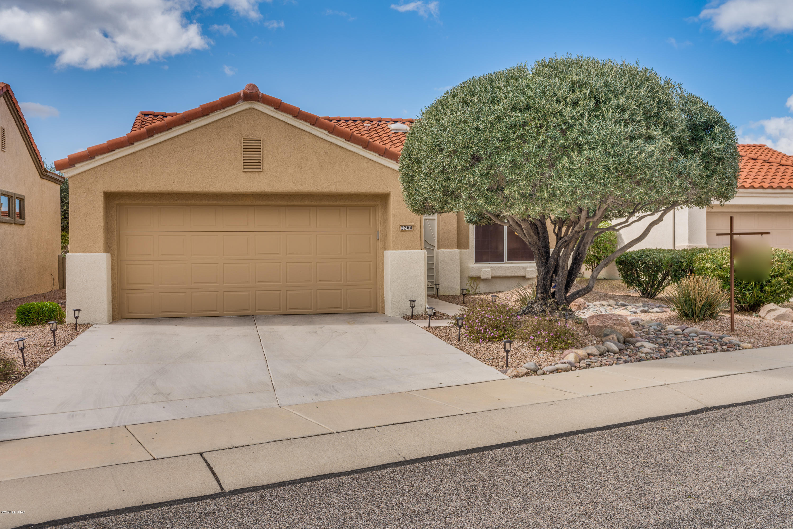 Don't miss out on this Amazing opportunity to own this Beautiful & well maintained Claridge model W/ 2 bed, 2 bath W/Den, open floor plan & 10' ft ceilings in the coveted Sun City Community. Relax on the covered patio & enjoy Mountain Views! New SS appliances W/Fridge, Beautiful granite counter tops & Tile floors throughout, Large Master bedroom with a walk-in shower & travertine tile surround & seat, brushed nickel fixtures.  Guest bath has a walk-in shower with travertine tile surround & seat , brushed nickel fixtures.  Exterior painted 10/19. Whole house water filtration system. Large planter pots do convey, Community amenities include golf, workout facility, 2 pools, restaurant, tennis, woodshop, pottery & jewelry shop & MORE. Conveniently located to shopping, hiking, dining.
