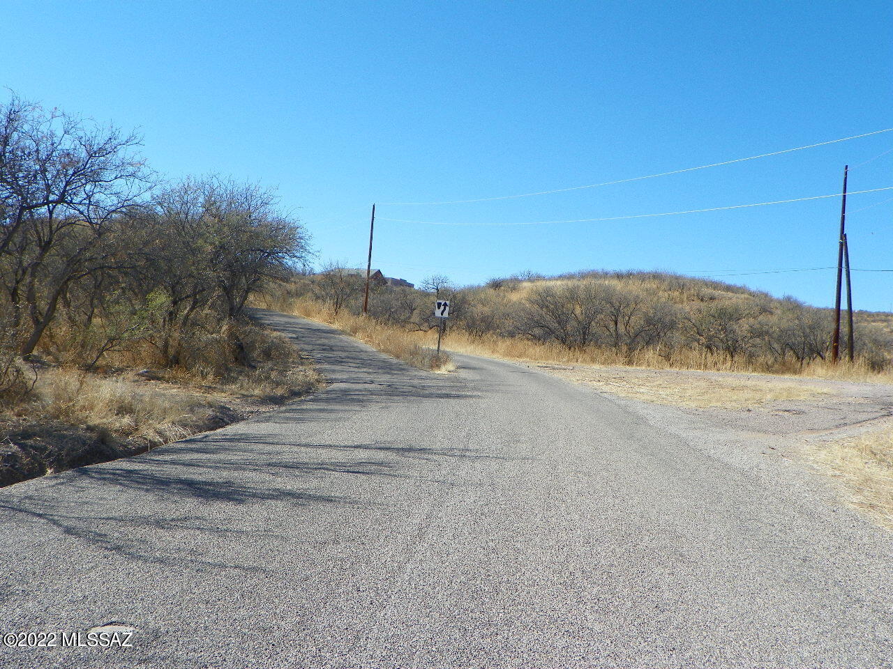 This lot has highs and lows.  Has a great high up place for a house to be built and includes lots more space for whatever you need.  1.71 acres.