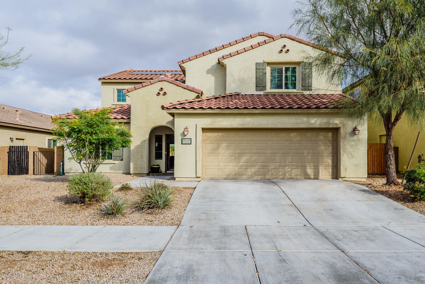 Absolutely Spectacular Sierra Morado 2 story home!! Built in 2013, this 2,880 SF, 5 Bed/4 bath home has everything on your buyer's checklist! Kitchen has all SS appliances, granite countertops, upgraded tile backsplash, wood cabinets, over-sized granite island, spacious pantry for extra storage and recessed lighting with 3 pendant lights. Master suite includes a garden tub, a wide walk-in shower, & executive height vanity with dual sinks. Other highlights to consider: roomy loft, elegant high ceilings, 12''12'' tile entire first floor minus bedrooms, built in bookshelf in downstairs study/den, one downstairs bedroom, Smart Panel in the laundry room, Jack & Jill bath upstairs, garage has a dedicated refrigerator/freezer outlet, ceiling fans and recessed lighting throughout, and 2 HVAC units Large backyard includes pavers, covered patio, grass, grape plants, apple tree, tangelo, lemon, raised garden bed, and east-side dog run.