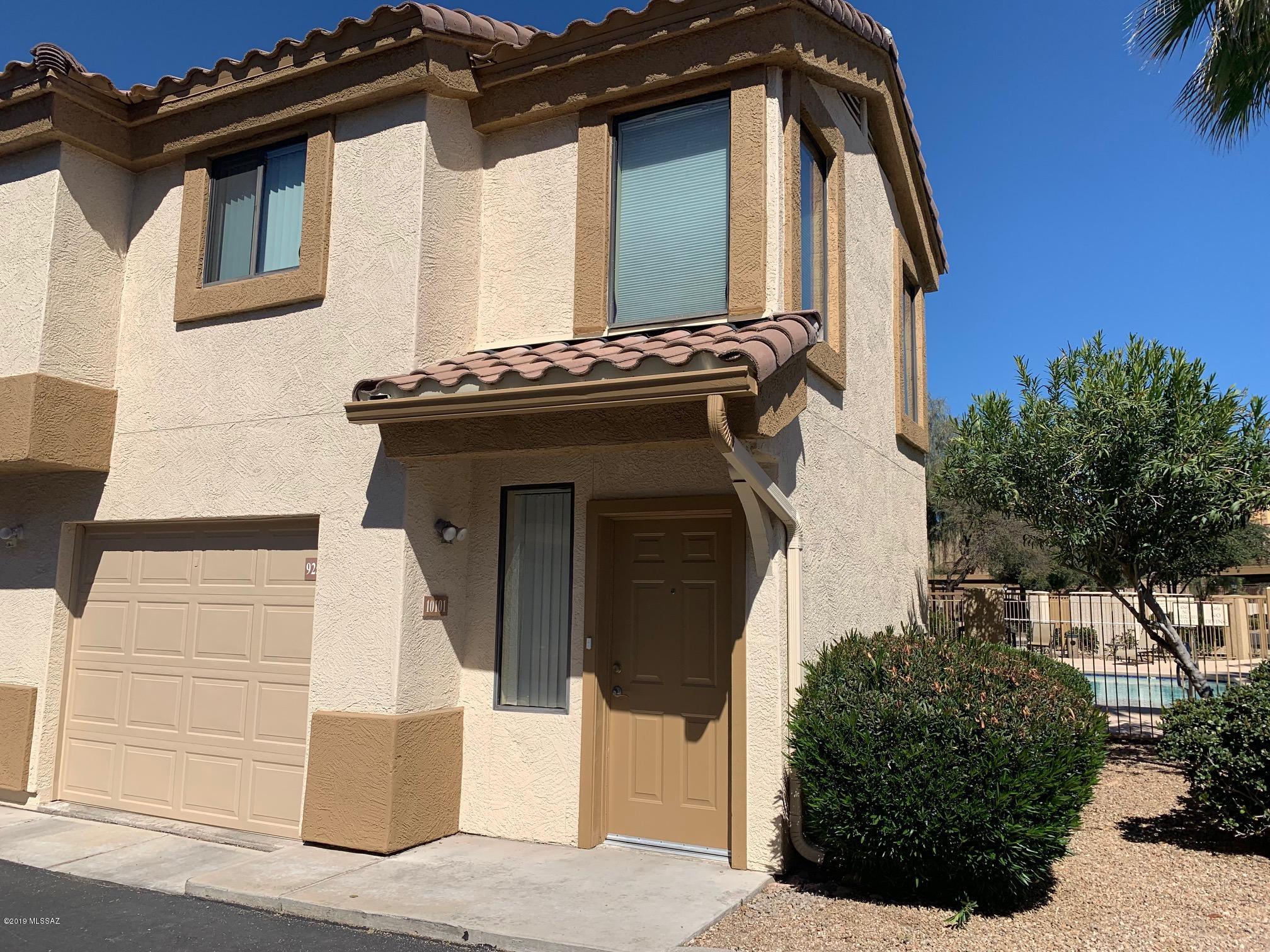 Come and see this hip loft style condo with a garage! Large patio overlooks the pool & spa.  Granite countertops, stainless appliances and cherry cabinets.  Laminate flooring throughout. Beautiful mountain views! This community is located at the heart of the foothills. Enjoy shopping and fine dining just steps away from your front door, or take a walk or ride on the Rillito River from your private entrance. This exclusive gated community has resort style amenities including 2 pools, spas & fitness center.