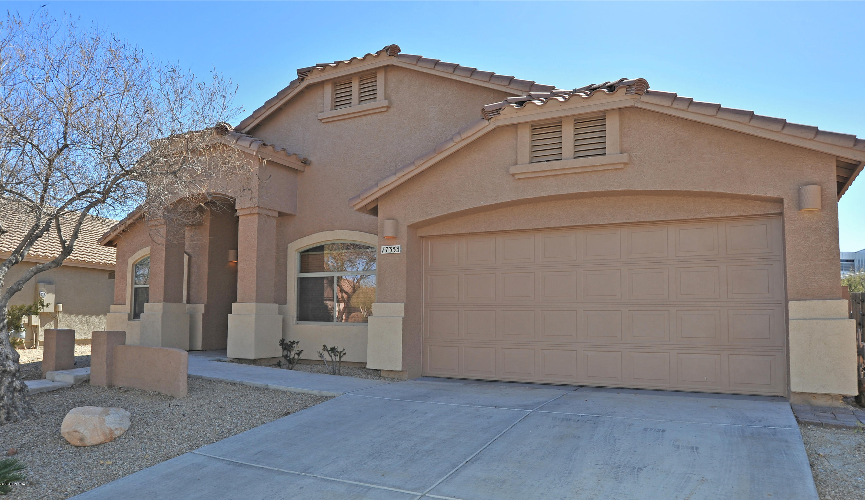 Very popular floorplan, open kitchen with stainless gas range, built in microwave and  Granite countertops with undermount sink, upgraded faucet and Center Island with bar seating for two. Lots of upgraded cabinetry. Gorgeous flooring, Ceiling fans, double doors to office/den/bedroom.  Master suite has dual sinks, garden tub, walk in shower and large walk in closet.  Community park with pool in a bonus. Park like backyard with lots of privacy, nobody behind you and great mountain views. Covered patio also an extended brick paver patio, great landscaping. Built in BBQ and to complete the perfect backyard