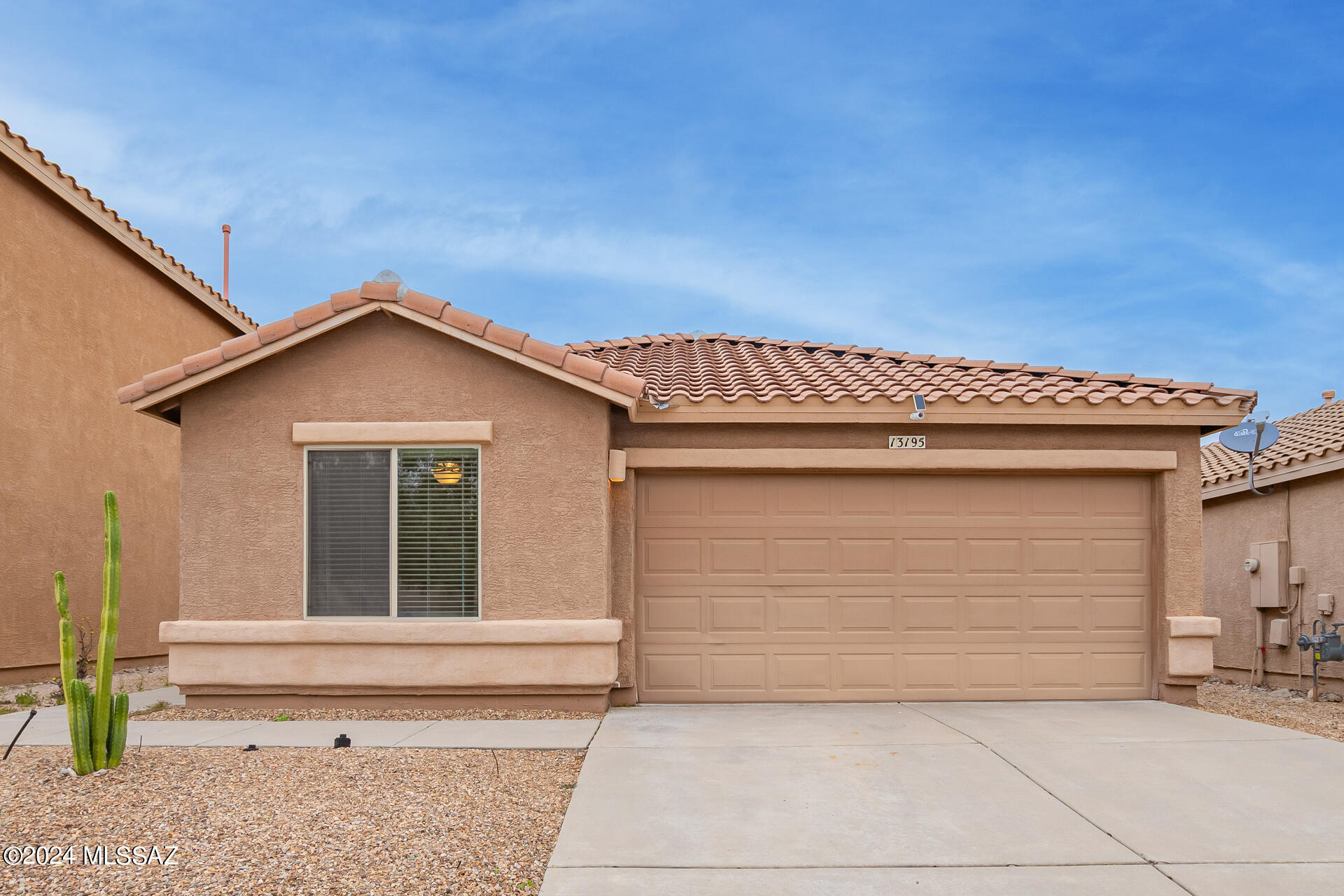 Meticulously maintained 3 bedroom, 2 bath home in Rancho Del Lago in Vail. Pride of ownership throughout. Den area is perfect for a home office or play area.  Open design features a split floorplan for privacy & comfort. Tile flooring in common areas. Great room radiates charm and warmth. Chef's kitchen. Real wood cabinets, stainless steel appliances, granite counters, functional center island with a breakfast bar. Large primary bedroom with a private bathroom and a walk-in closet. Glass sliding door opens to a fully walled backyard. A private and tranquil haven with a covered patio and mountain views. A blank slate awaits your personal touch. Priced to sell. Please schedule your viewing today. Owner/Agent.