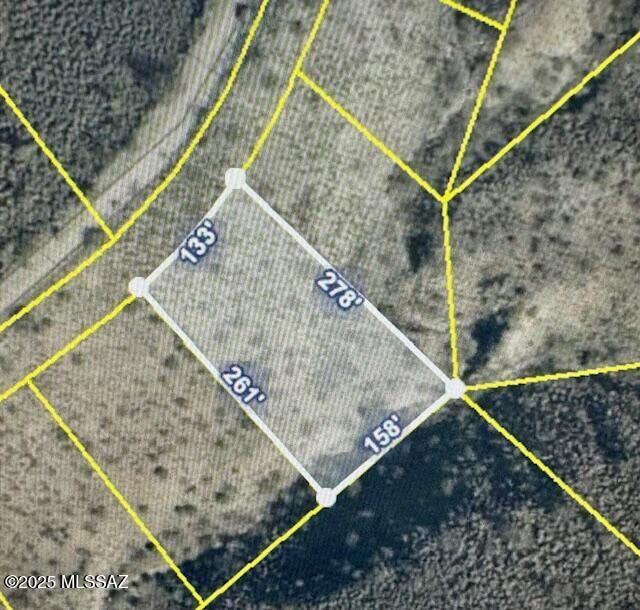 Nearly 1 acre in scenic Rio Rico with breathtaking mountain views! Enjoy peaceful rural living while still being close to shopping, dining, and I-19 for easy access to Nogales or Tucson. The perfect spot to build your dream home surrounded by natural beauty and convenience.
