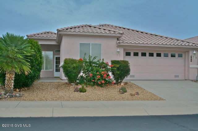 REALLY GREAT PRICE! for this pretty, SINGLE FAMILY home in Sunrise Pointe Vistas! Soft earth tones and custom paint create a warm and welcoming ambiance. Lots of windows let natural light flow throughout. The kitchen is big and open and overlooks the back patio. The large family room is adjacent to the kitchen and features a glowing fireplace for all of those memorable gatherings. The coffered ceiling in the dining room adds an elegant touch. The master suite has a lovely bay window and French doors lead to the covered back patio. This is a house you can live in with ease, especially when you see the price!