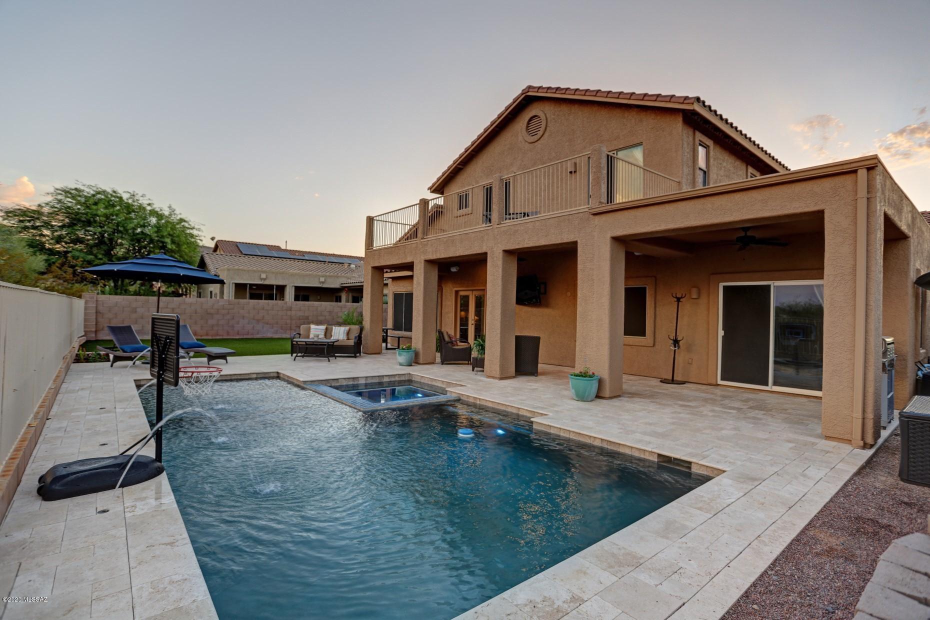 Immaculate move-in ready home. This 5 BR + Den, 4 bath home sits on premium lot backing to natural desert & gorgeous mountain views. The ONLY floor plan like this in the community, with a main-level, 2-room guest suite. Perfect for mother-in-law suite, visitors, or playroom.
This home has it all: Upgraded carpet, recently painted exterior, custom interior & exterior surround sound, granite slab counters, travertine tile, SS appliances, storage cabinets in garage and RO water system. Entertainers dream backyard (NO NEIGHBORS behind you) that boasts a gas heated pool/spa, large covered patio, turf, utility gate with pad for your toys or basketball court.
Buyer to verify all facts & figures including those in MLS. Owner/Agent.
Furniture & TVs available for sale on separate bill of sale.