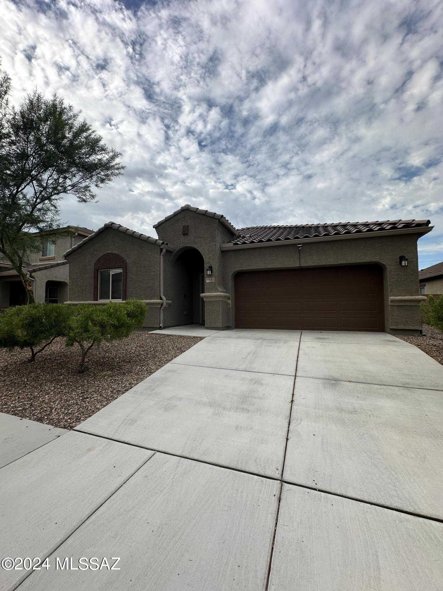 Beautiful home for rent in Saguaro Bloom! This nicely appointed 3 bedrooms PLUS a den/office, 3 bath home is ready for you. Tile flooring throughout with carpet in the bedrooms. Large kitchen with island, granite countertops, espresso cabinets and stainless-steel appliances. Kitchen flows beautifully into a large family/living room where you can see the mountain views from the back door. Outback, watch the sunset while enjoying the covered patio, turf and pavers. This home does include a 3-car epoxy coated tandem garage with plenty of storage. Saguaro Bloom features a community center, 2 pools and activities for the entire community to enjoy! Located in Marana school district and a short drive to I-10 and local stores, restaurants and more! Pets considered, under 50lbs.