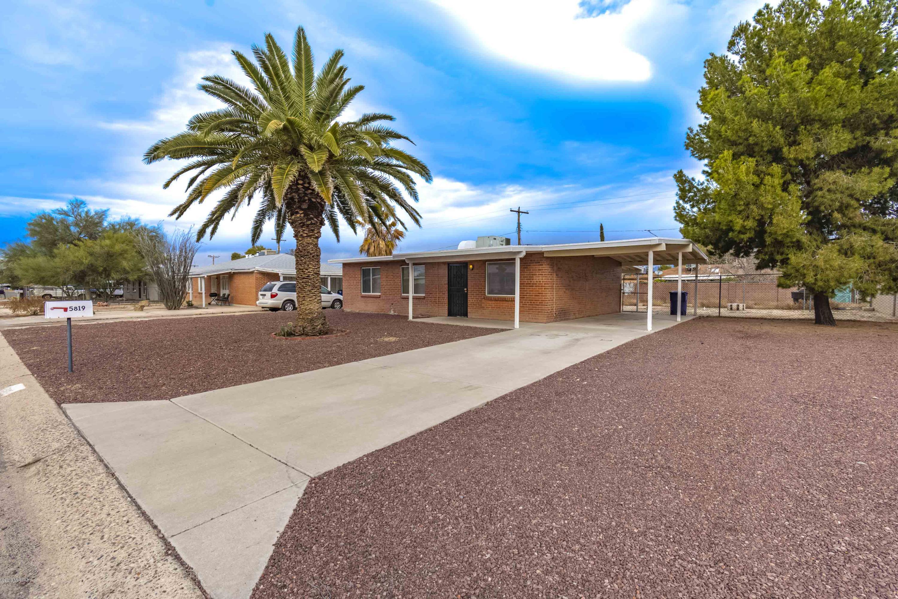 Super cute and clean 3 BR 1 BA home with great curb appeal.  Attractive red brick with large concrete driveway and desert landscape.  Dual pane windows, newer kitchen, large attached storage room, with additional storage shed.  Front yard and backyard patio coverings.  Air conditioning, a new water heater, and complete new copper water pipes installed within the last recent years.  This house is ready to go and should provide many years of relaxing ownership, it even includes a home warranty.  Owner/Agent