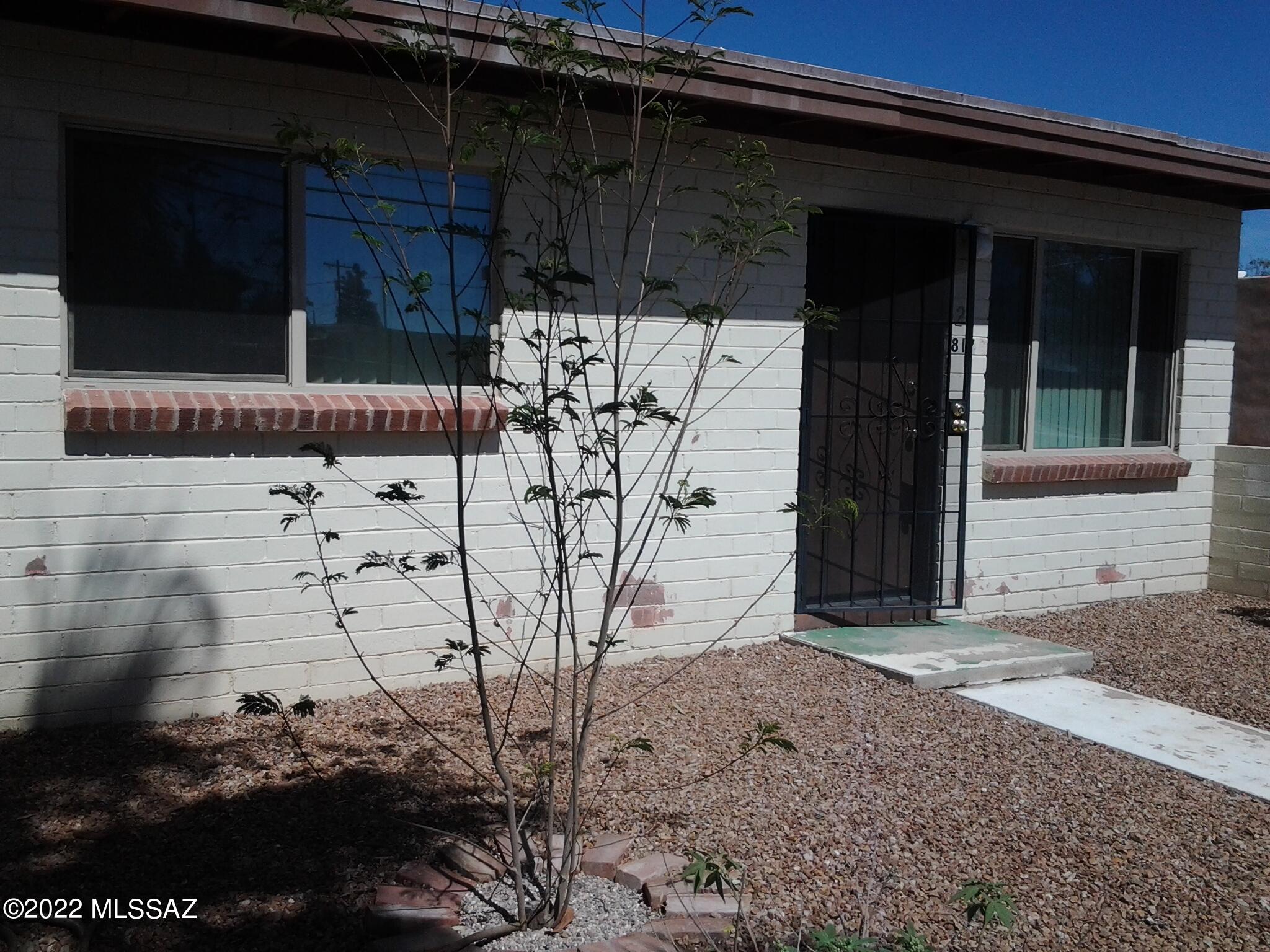 Awesome opportunity to own a currently fully rented income producing property. walled front courtyard. HUGE back yard, upgrades already completed, including dual pane windows, 6ft back yard wood fence, replacement of plumbed gas lines to both units. Each unit has its own address and separate meters for electric and N.gas. These units rent quickly. Close to the U of A, Reid Park, Bus Line and minutes to downtown. Or, live in one unit and rent the other. Other people pay your mortgage! Tenants on a month to month lease.