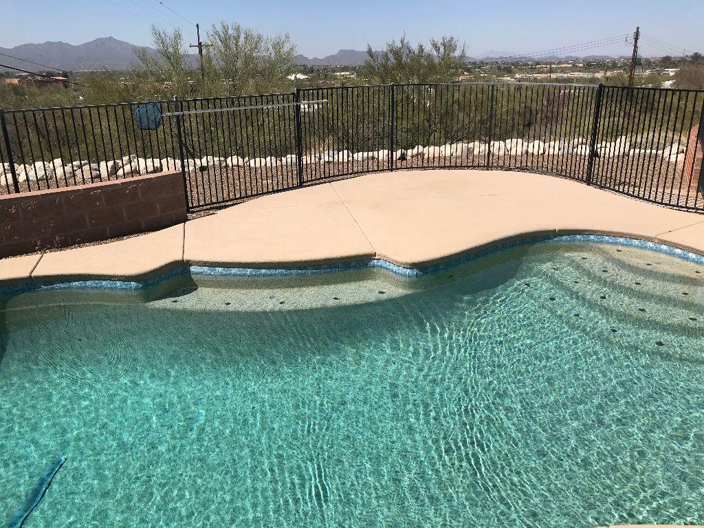 Location and views highlight this solid 3bed/2bath home in sought-after Suffolk Hills, near Ina & Oracle. Large, elevated lot offers privacy and great mountain views front and back! 
Enjoy the large covered patio overlooking a cool, Pebble-Tec pool with automatic cleaning (no vacuuming) and Pentair variable speed pump. Entire home features tile floors. Solar tubes brighten the expansive kitchen-dining area. The extended carport features plenty of storage room. Extensive stone work/landscaping highlight almost an acre of this view property.
This property is being sold as-is, and is ready for your new touches and updates.