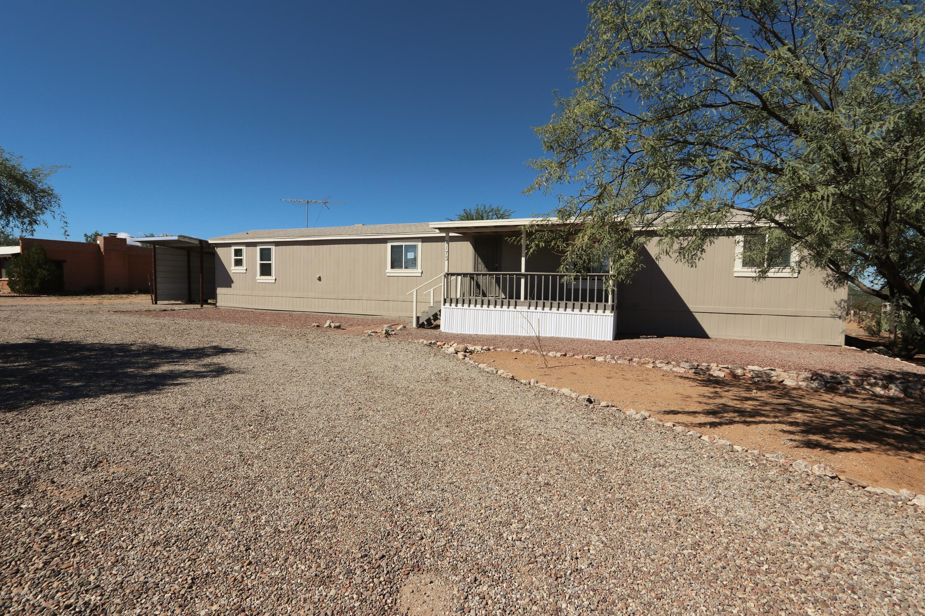 Seller will counter or accept offers between $134,000 and $150,000. Spacious 4 bedroom 2 bath home on over an acre!  Nice bright floor plan with ceiling fans, built in cabinets/desk, huge kitchen with island that opens up to living area, dual sinks in master and neutral flooring throughout. Beautiful green trees and vegetation, circular driveway, carport, oversized deck outback, covered porch in the front and storage shed.  A must see. This one won't last!