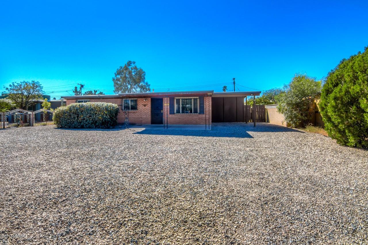 Solid brick home on enormous lot! Back yard has double gate access and plenty of room for toys, pool or landscaping and perfect for entertaining! Remodeled home with granite counter tops, updated paint, floor, fixtures, kitchen and bathroom, this home is move in ready. Cold AC, covered parking and easy care yards. No HOA. Plenty of room for RV parking. Perfect for rental or owner occupant. Hurry on this one!