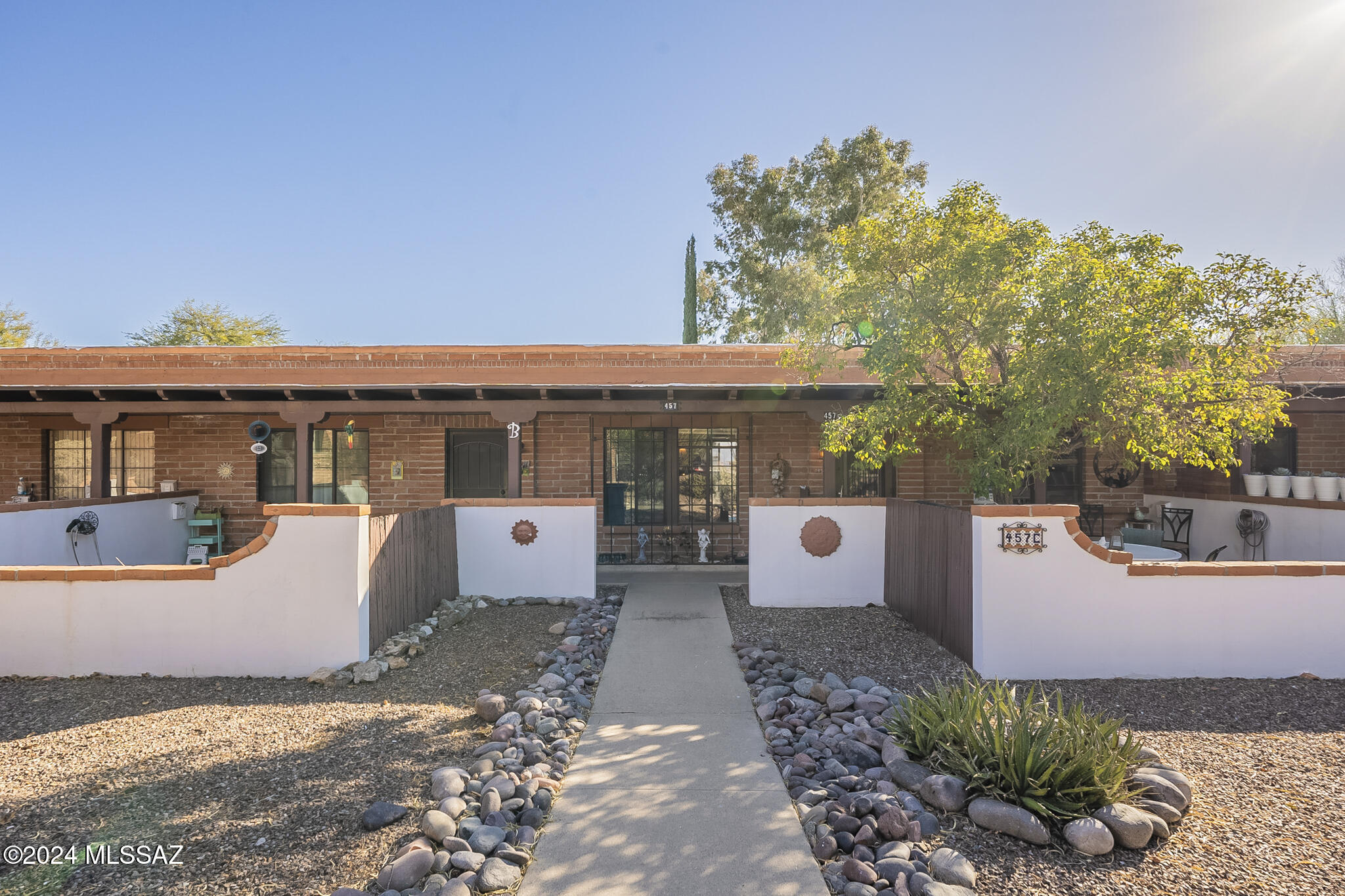This beautiful villa is fully furnished inside and out and ready to move right in; a true standout! Featuring tasteful Southwest designer colors and gorgeous tile throughout the living room, kitchen, bedroom and bathroom, it exudes charm and style. The kitchen is well-equipped with a full-sized refrigerator, gas stove, and even a dishwasher—a good find in the villas! The location offers a peaceful retreat, set back for added privacy with a lovely common area featuring a delightful cacti garden, benches to relax, and stunning mountain top views.
This villa boasts an exceptional location, offering both tranquility and convenience. It's a prime property in a sought-after area. NO GVR, but it's available if desired.
