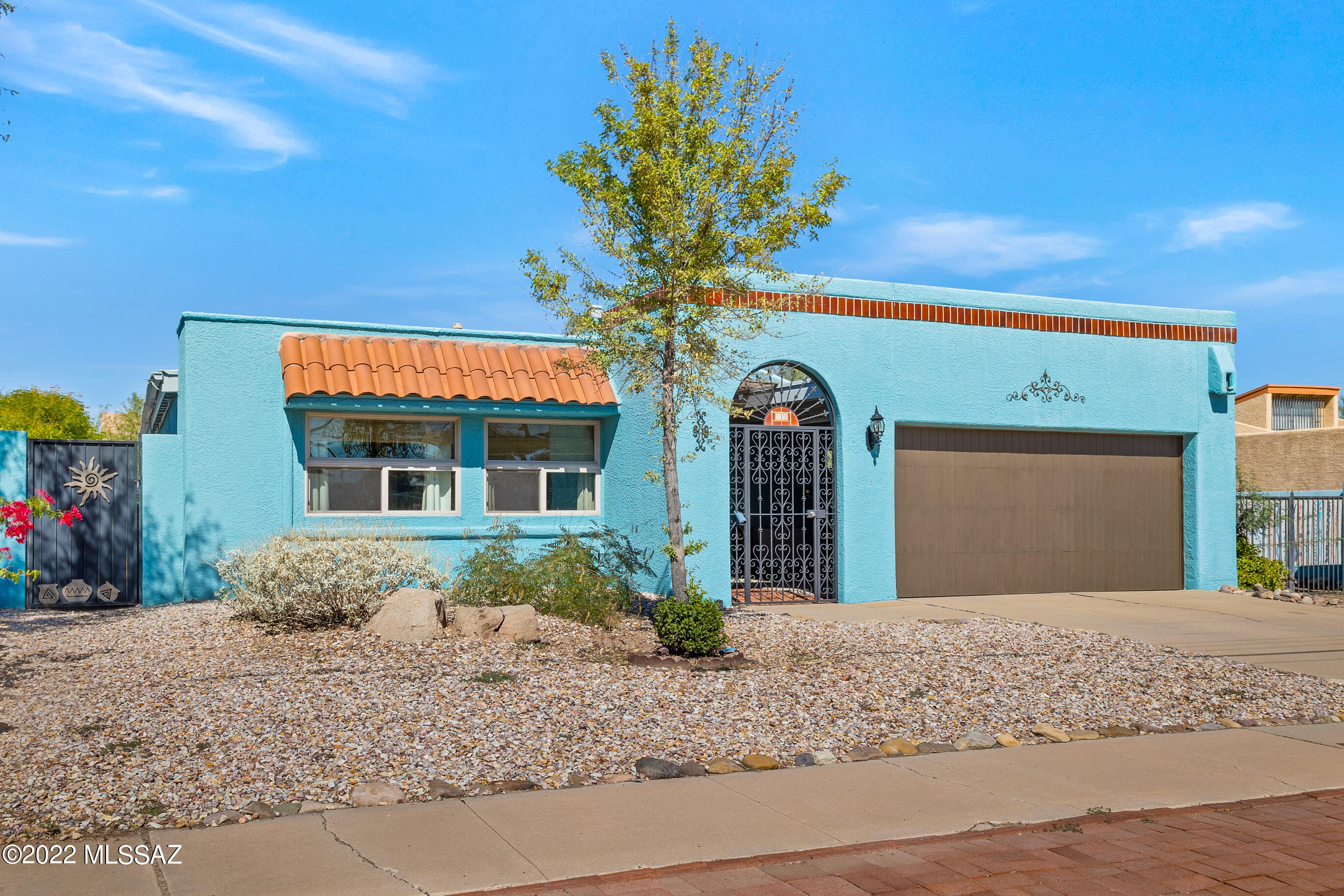 Amazing Menlo Park location with 3 bedrooms & 2 bathrooms!! Charming & beautifully updated in absolutely move in ready condition. Walk to The Mercado, Annex, Tumamoc, A mountain & downtown Tucson! This home sits on a large lot with the rare find of a 2 car garage & RV parking!! Updated Kitchen, baths and brand new AC. Perfect for the hobbyist, artist, student, etc. Vaulted ceilings with loads of natural light. Huge great room floorplan. Large private yard boasts plenty of room for entertaining. Enjoy your coffee in the morning next to the relaxing sound of your water fountain.  This is the perfect home for those desiring the urban experience within walking distance to all that downtown Tucson has to offer. Seller will accept or counter offers between $350,000-375,000.