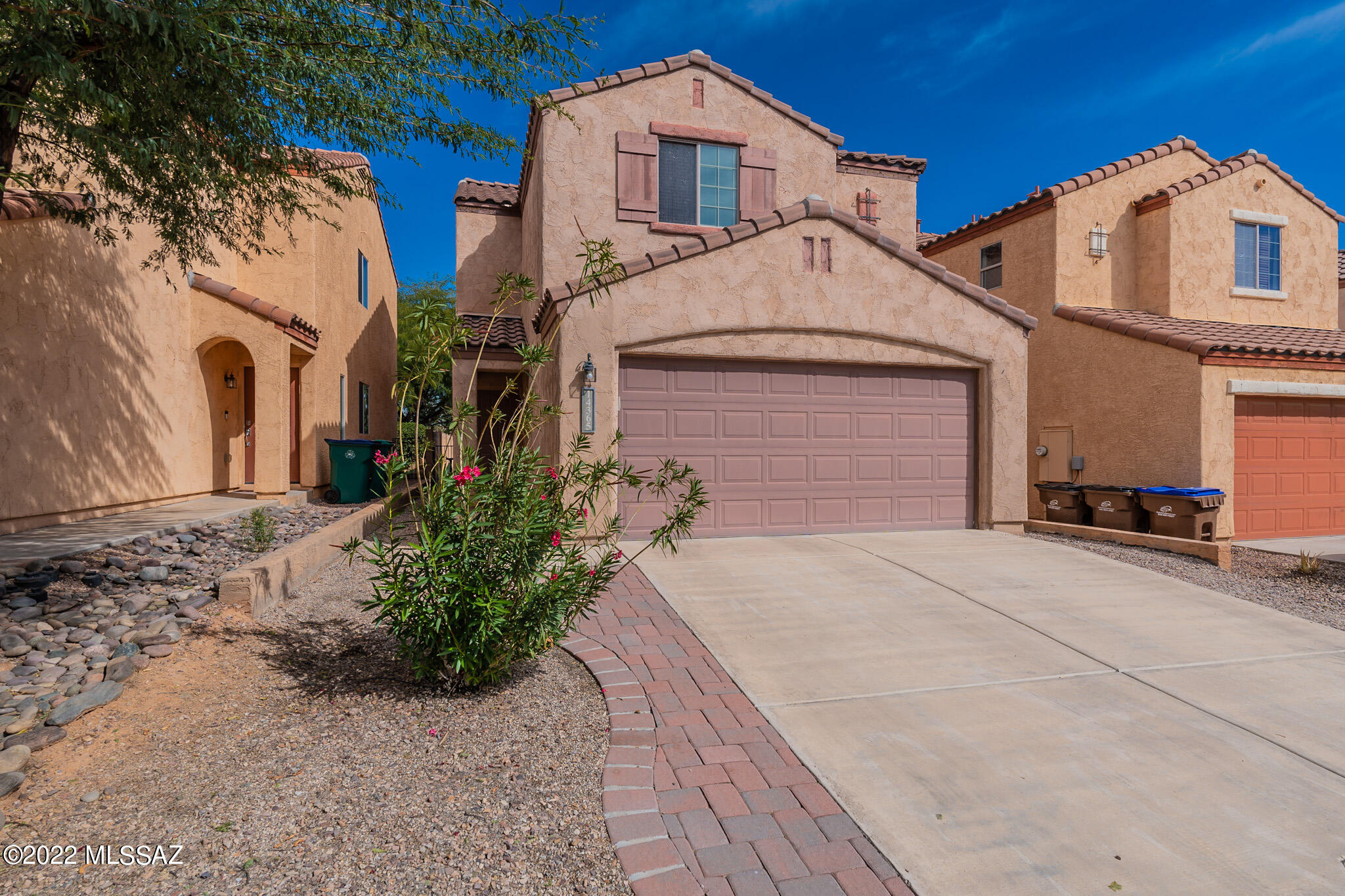 A delightful three bedroom and two and half bath home located in the very popular community of Rancho Sahuarita. You are immediately welcomed into a spacious great room that features tile flooring and neutral paint tones. The kitchen offers stylish counter tops and stainless-steel appliances. A half bath is conveniently located on the first floor. The primary bedroom is spacious and features dual sink vanity, walk-in shower and closet. The upstairs loft space is ideal for a play area or office. Two additional bedrooms and laundry room complement the rest of the second floor. Enjoy the private backyard with no neighbors backing the lot. If you love to be outdoors the neighborhood amenities include a rec center, pools, lake, parks, basketball courts, walking trails and much more!