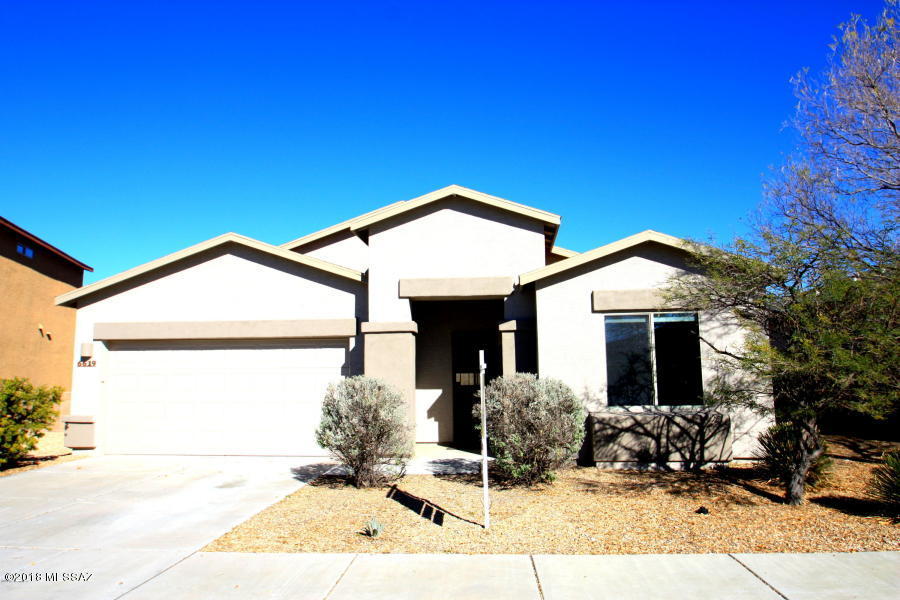 Home features 3 bedrooms, 2 bathrooms, Kitchen w/ S.S. Appliances, Great Room with Slider leading to covered Patio, Views of Mountains from Great Room Area/Dining Area. Split bedroom floorplan, neutral colors, ceiling fans in every room.