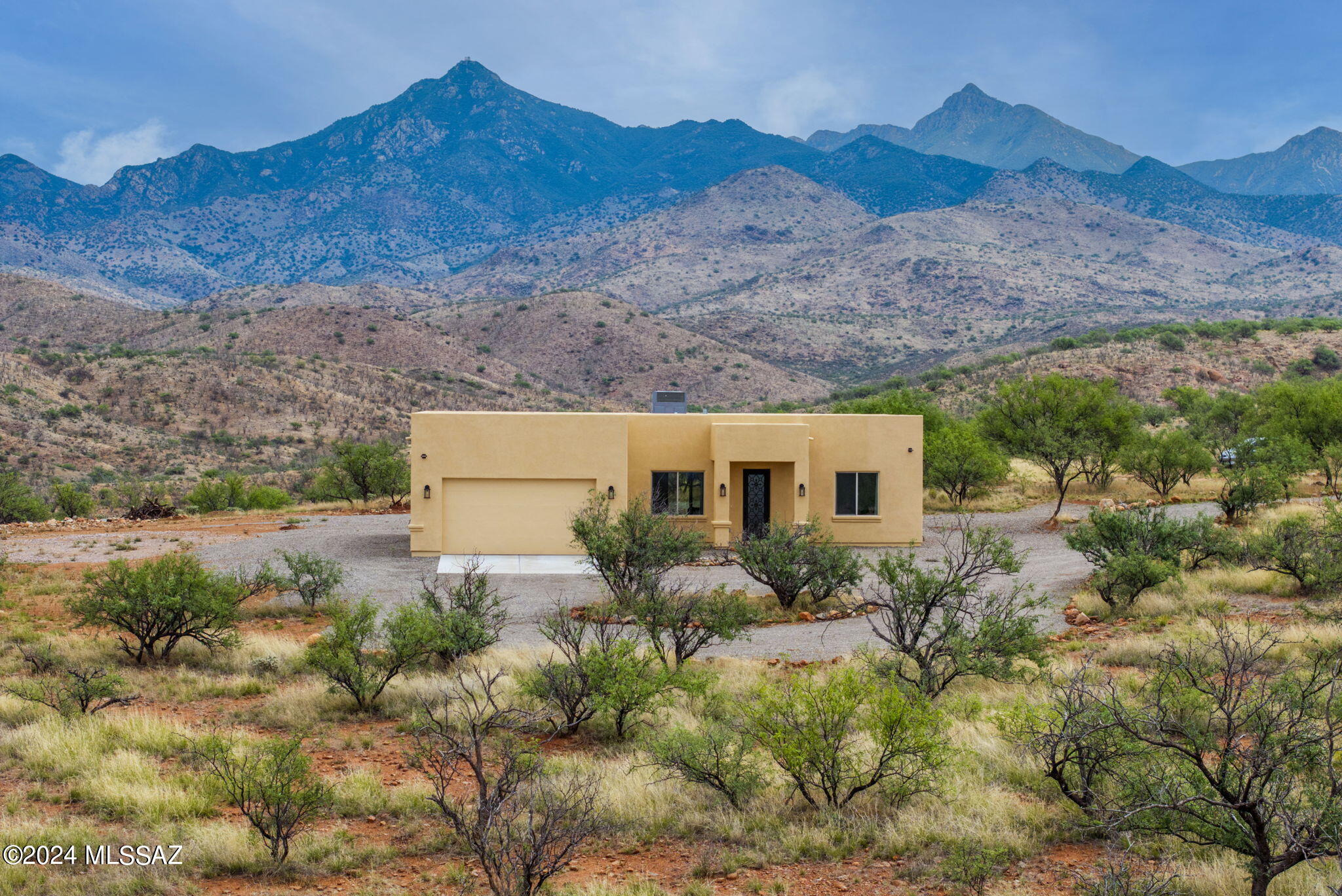 **Motivated Sellers** Looking for Land? Big shop? New Construction home? Look no more! Welcome to 22 Vigas Lane. Sitting on over 36 acres of pristine high desert is a beautiful newly constructed Santa Fe-style home. With 3 bedrooms and 2 full bathrooms, the open floor plan is split for Primary and guest privacy. With beautiful granite and tile throughout, keeping this home fresh looking will be easy! Be captivated by the 360-degree views- literally, sit anywhere and see mountains in all directions. Enjoy the numerous species of wildlife that frequent daily. This is not all... For the hobbyist person utilize the 40x60 steel structure that has tons of square footage for cars, equipment, tools, etc.. This is not all! In that 40x60 structure is a fully functional apartment! With about 1000 sqft of living space- you have a fully functional kitchen, loft, bedroom, and bathroom also a full laundry room with conveying washer and dryer and a new Hot tub! There is so much space on this lot you can place arenas, corrals anything you seek fit. Not only will you not hear city noises or cars passing by- you're up against state/BLM land so you won't have anyone building to obscure your views! You have to see this place! Get it before too late!