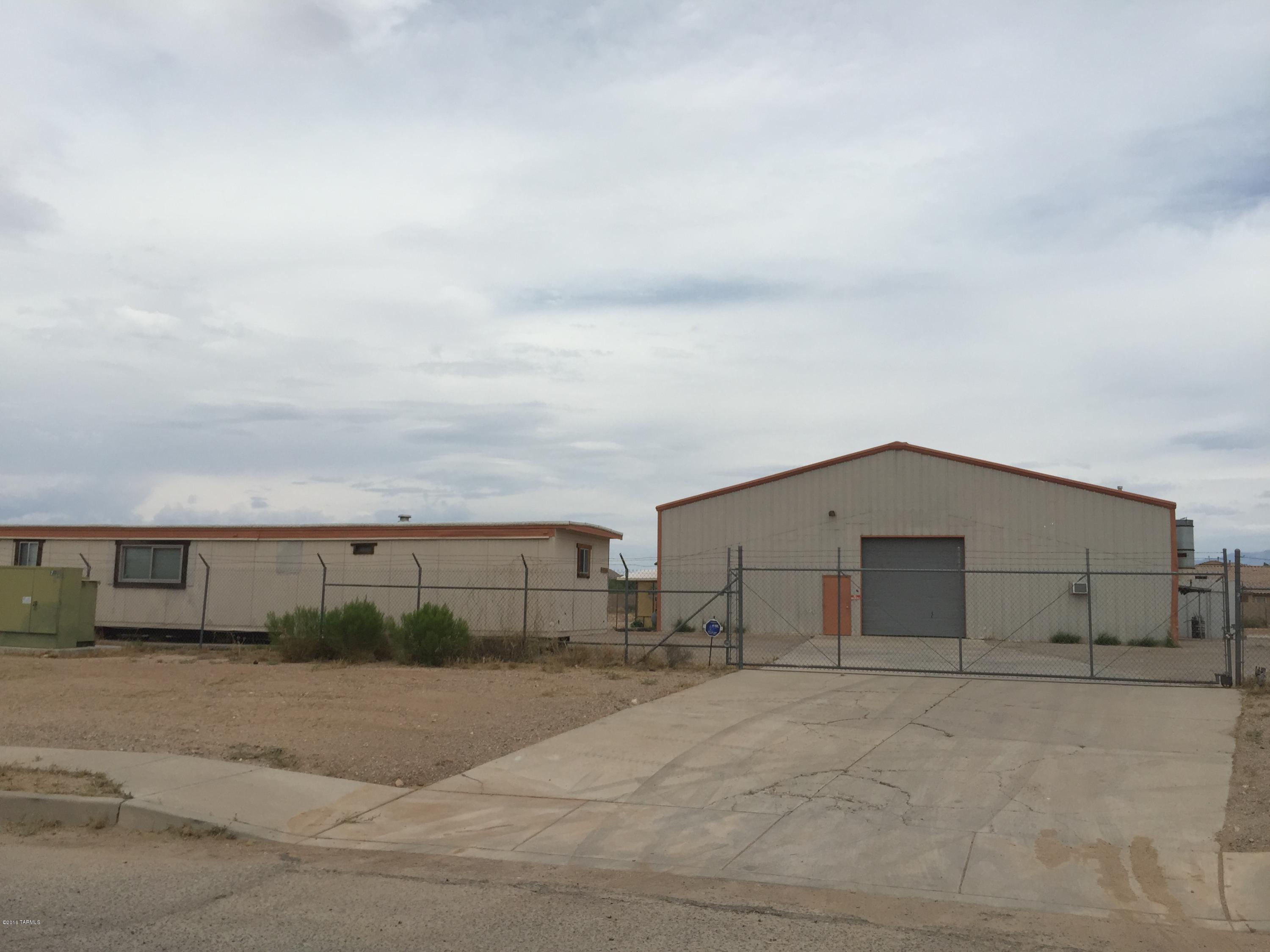 Very nice warehouse building on 2 acres located right off Interstate-10 and Los Reales.. Large Fenced yard with ample amounts of parking. Portion of yard is paved as well. 3 Phase Electric, tons of possibilities here! Includes two parcels: 140-40-0470 and 140-40-0480

Los Reales and Corona Rd