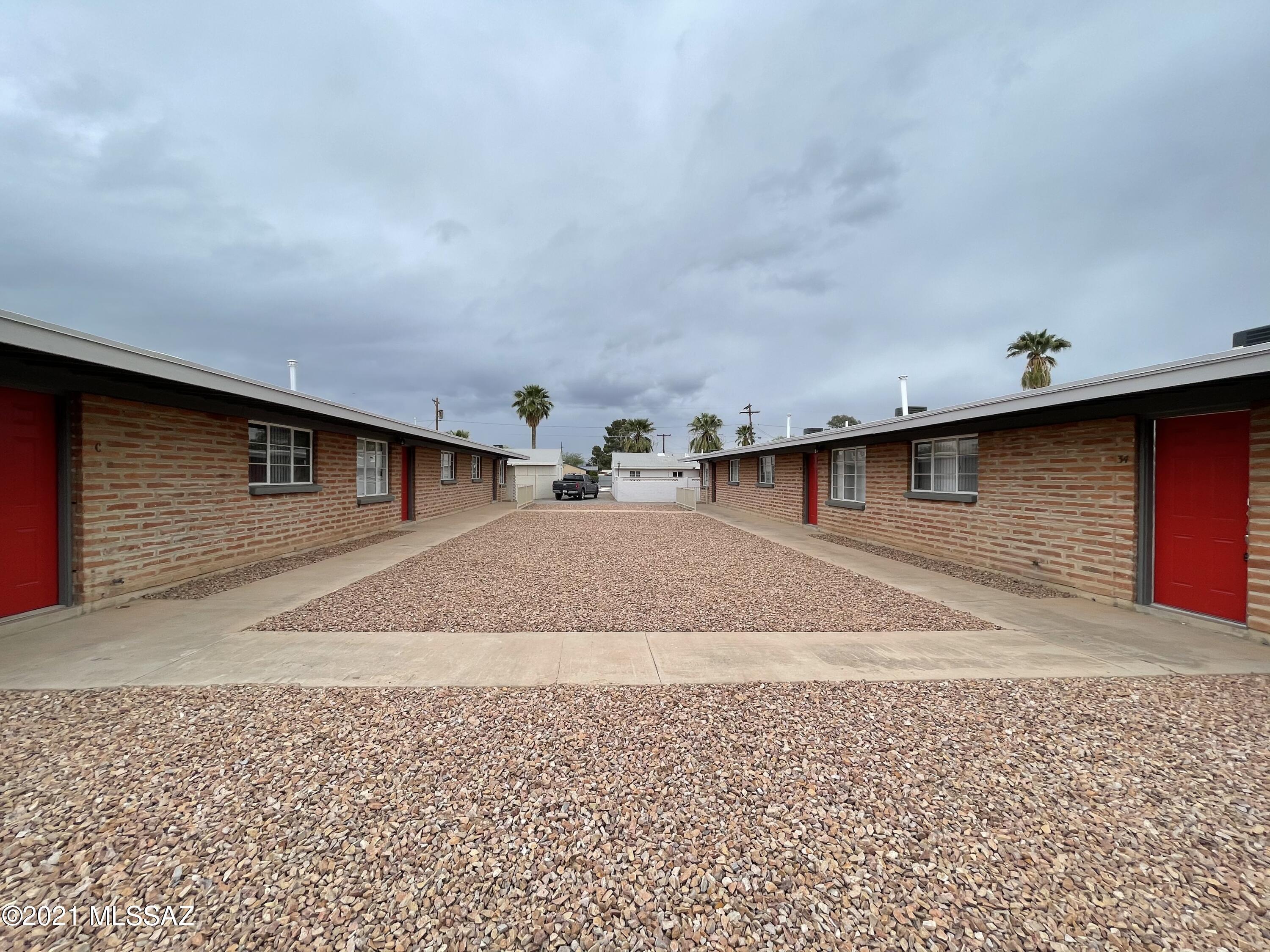 8 unit TURN KEY  apartment Complex- 2 tax codes ( 122-18-010C and  122-18-010D ) can be purchased with 2 separate conventional loans. Unit count and mix is 6, 2 bed 1 bath with fenced off yards and 2, 3 bed 1 bath units with large covered back patios.  Each unit has 1 covered parking spot, Washer and Dryers for each unit, new HVAC for each unit. and more.