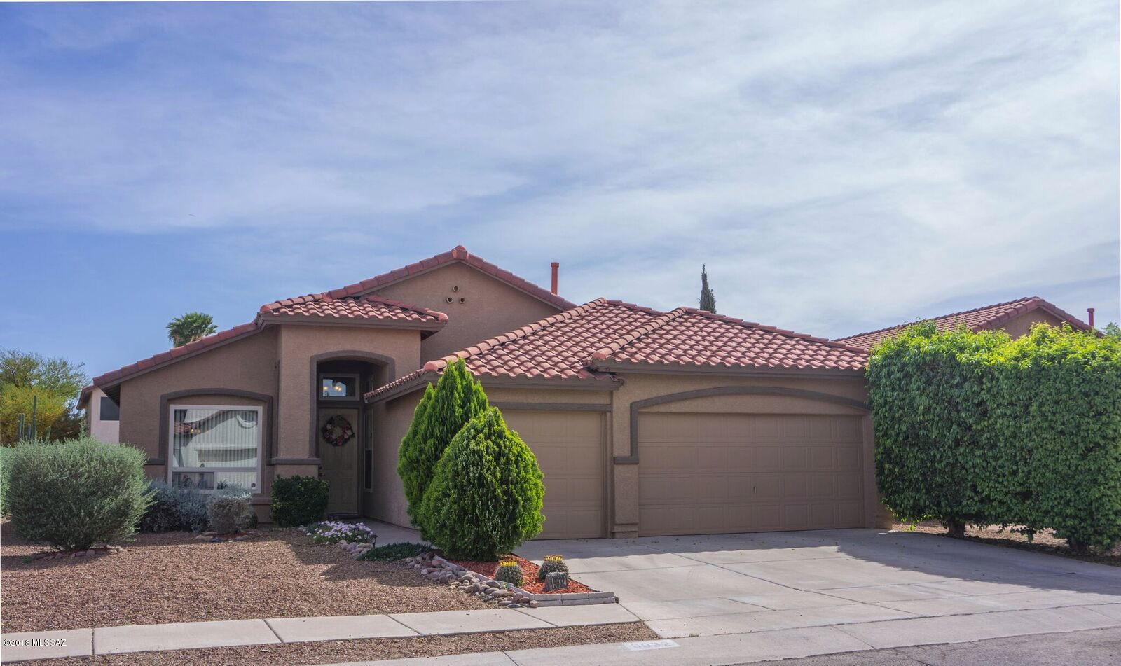 Pride of ownership showcased in this 3bd/2ba home with den (currently used as a guest room). Double sinks in both bathrooms. Open floor plan and vaulted ceilings. Many upgrades: tile floors in kitchen, bathrooms and foyer; wood-look laminate flooring in all other rooms; 16 SEER HVAC; energy-efficient windows; ceiling fans in 5 rooms, Scaleblaster water conditioning system, plumbing and lighting fixtures; kitchen updates inc. stainless appliances (gas stove), Thomasville kitchen cabinets, and granite counters. Exterior recently painted. Alarm installed w/optional camera. Plumbed for BBQ gas at covered patio. Low care landscaping with irrigation. NO POLY!