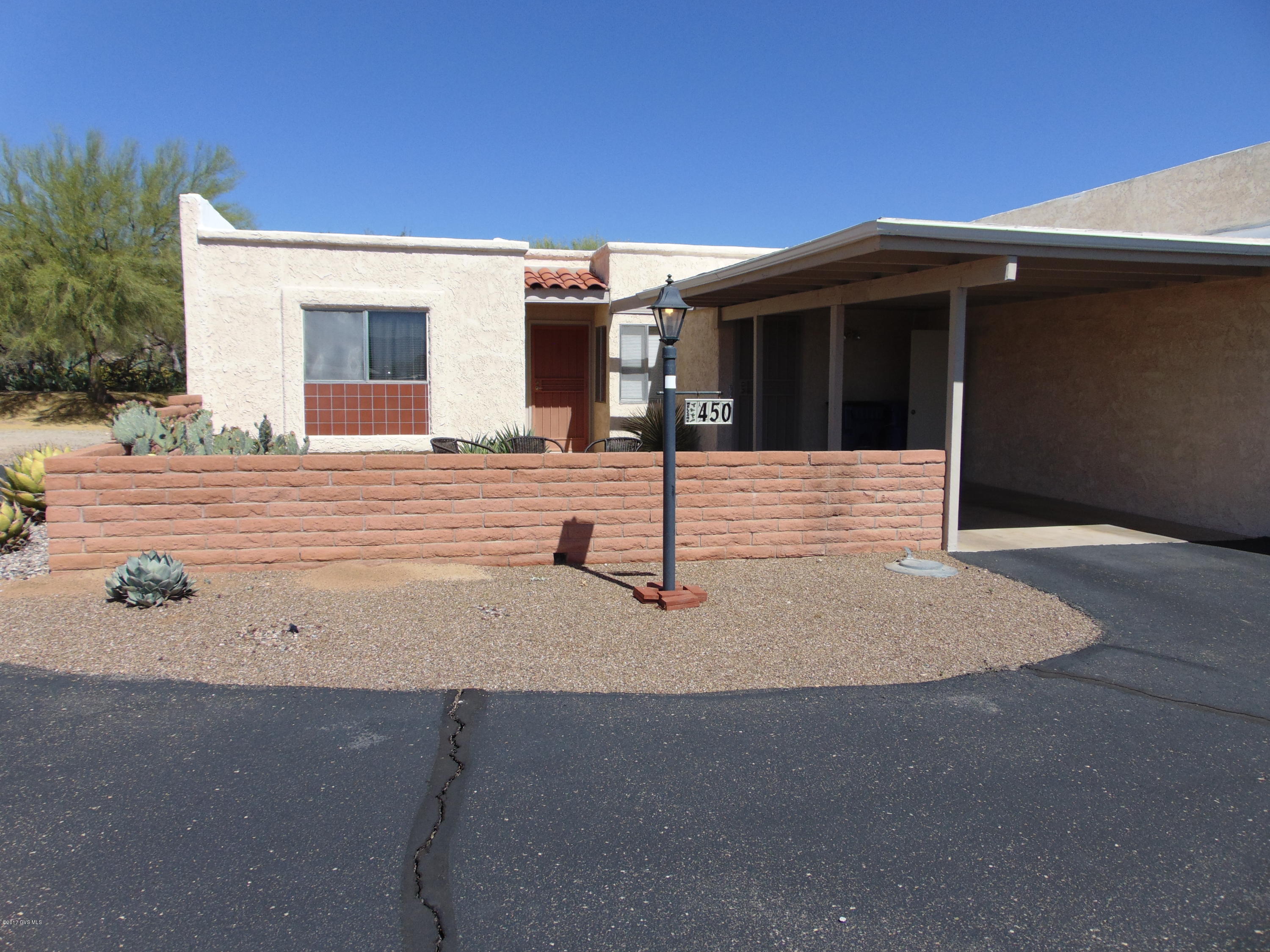 LOVELY WELL MAINTAINED TOWNHOME WITH MTN. VIEWS FROM FRONT PATIO AND BACKS TO COMMON GROUND AND ARROYO FOR ABUNDANCE OF WILDLIFE WATCHING, EASY CARE. GREAT AS A WINTER RETREAT OR YEAR ROUND RESIDENT. HOA HAS IT'S OWN REC CENTER, DECORATOR COLORS, WOOD LAMINATE FLOORS EXCEPT BEDROOMS