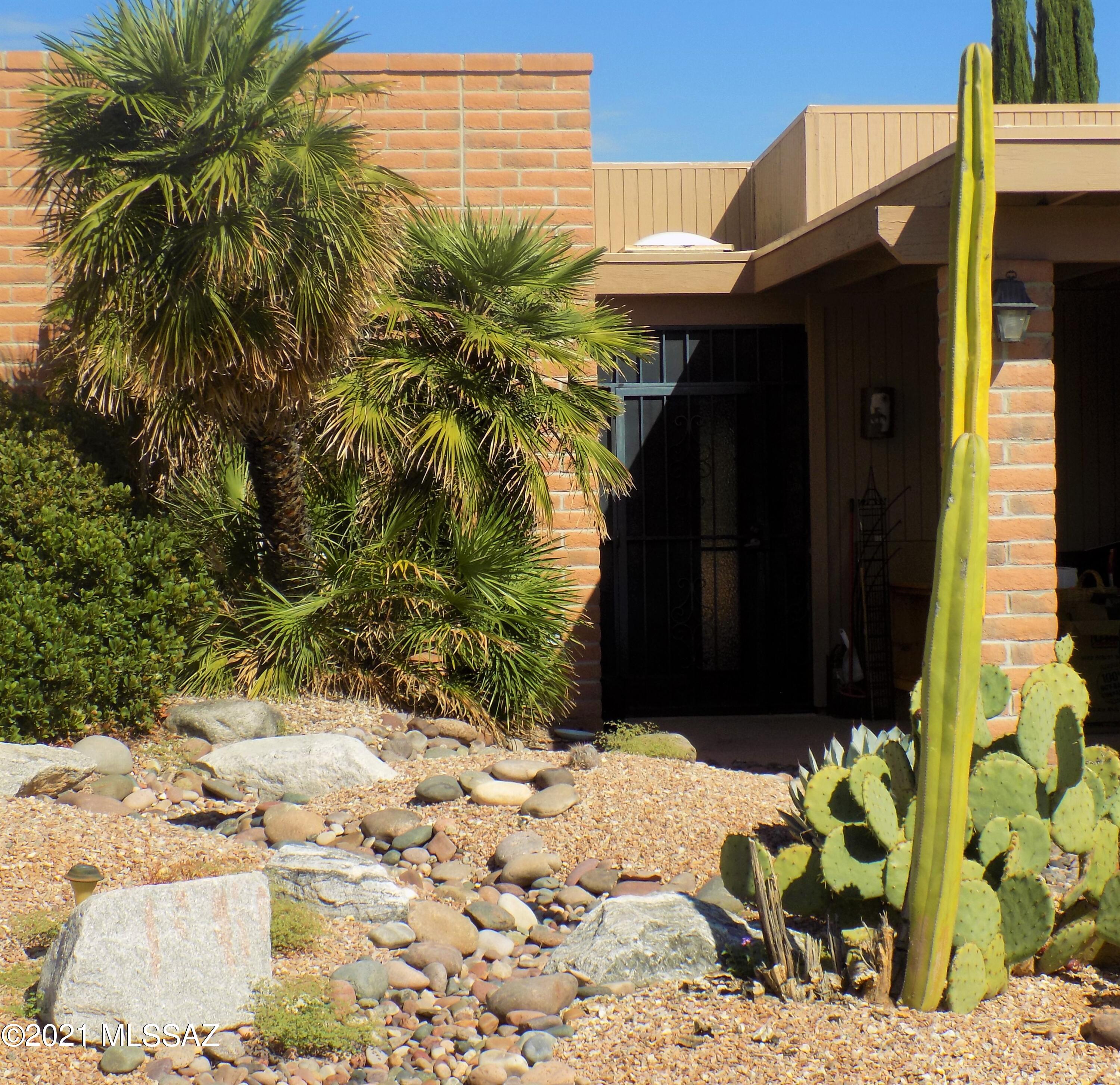 Desert Hills IV 2 bed 2 bath townhome close to Green Valley Rec. Lovely mountain views from the front of the property. Skylights in the kitchen and in both bathrooms! Rear covered patio with brick pavers into the yard. HVAC only 5 years old.