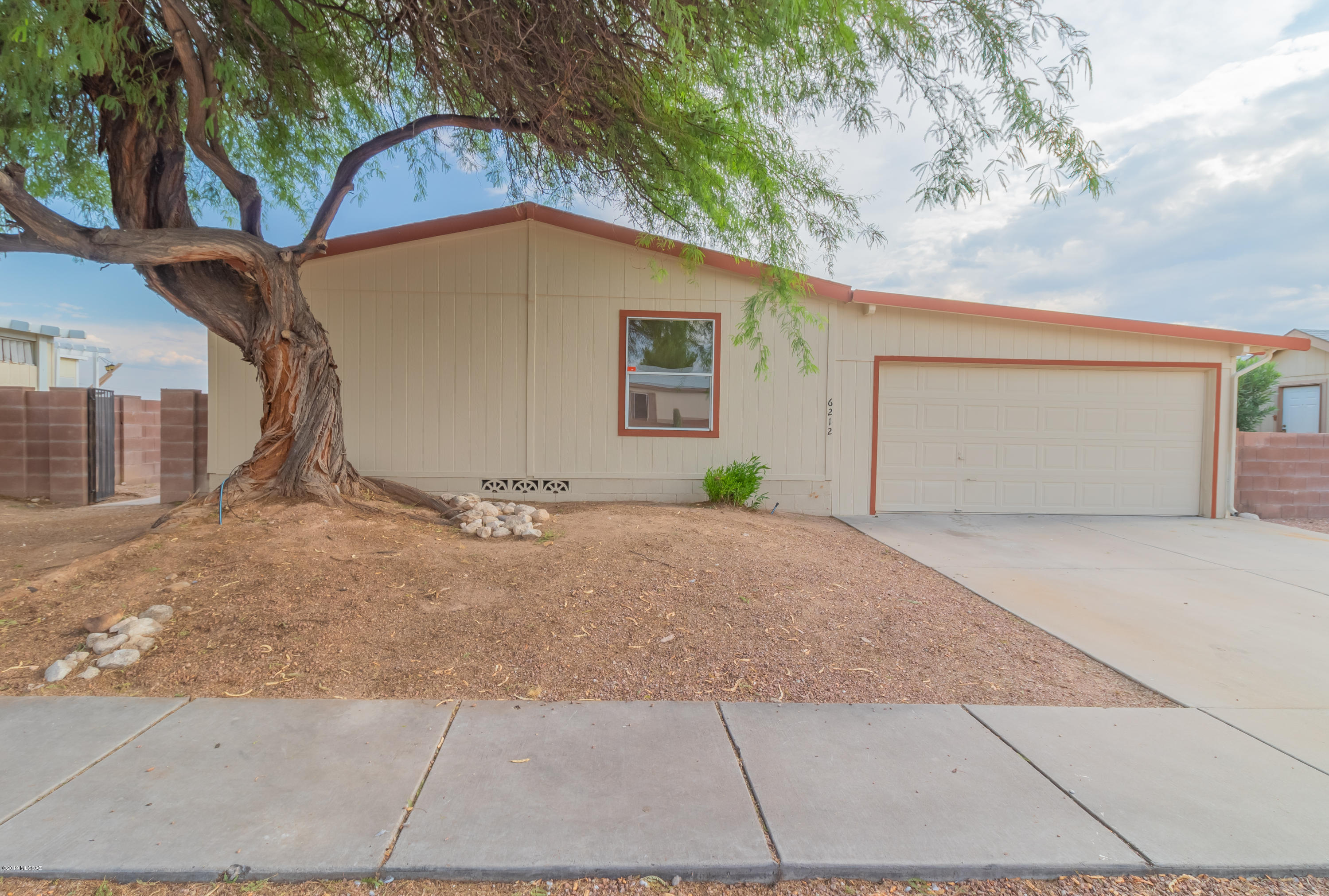 Seller will accept or counter offers between $134,900 & $139,900. Step inside this magnificent home ideally located in the gated Window Rock East Community. Upon entering this home, you are greeted with gorgeous wood style flooring. The living area is the perfect size for entertaining or relaxing with the family! Create a great meal in your open concept kitchen and enjoy new stainless-steel appliances! This home beams with natural lighting, and the simple color palette is sure to enhance your belongings from the start! Enjoy a spacious master bedroom with your own private master bath! Appreciate two additional bedrooms perfect for guests or an office! Step outside to your low maintenance yard and enjoy family time!