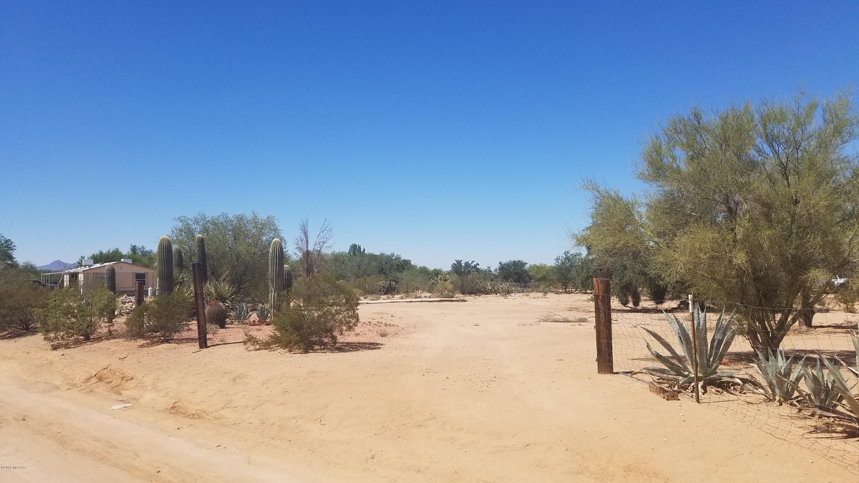 Just short of an acre in the Picture Rocks area.  Great country living and still close enough to all the necessary amenities.  Approximately 9 miles from I-10, shopping, restaurants, movies, parks and so much more.  Live the quiet, country life with the city close at hand.