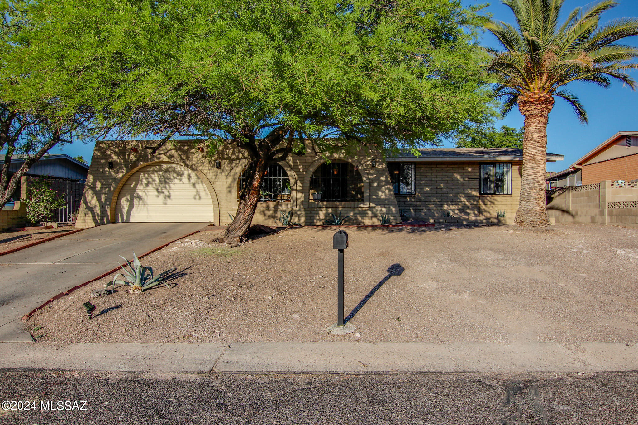 Discover your dream home in this beautifully updated 3-bedroom, 2-bathroom home, nestled in a serene neighborhood just 15 minutes from downtown Tucson. This charming residence offers a blend of modern amenities and cozy comforts, perfect for families or first-time buyers, this move-in-ready property offers comfort, style, and convenience. Enjoy cooking in a newly remodeled kitchen with stainless steel appliances. Each bedroom features new energy efficient fans and thoughtful updates for maximum comfort. Newly renovated bathrooms with contemporary fixtures. The attention to detail is evident with stylish and durable vinyl plank flooring throughout the home. A versatile bonus room to suit your needs, whether it's a home office, playroom, or guest room. Enclosed workshop, ideal for DIY projects or additional storage. The backyard offers ample space for entertainment or simply unwinding after a long day. This home is a must-see to fully appreciate all the wonderful features. Come and experience the perfect blend of comfort, style, and convenience that this home has to offer!