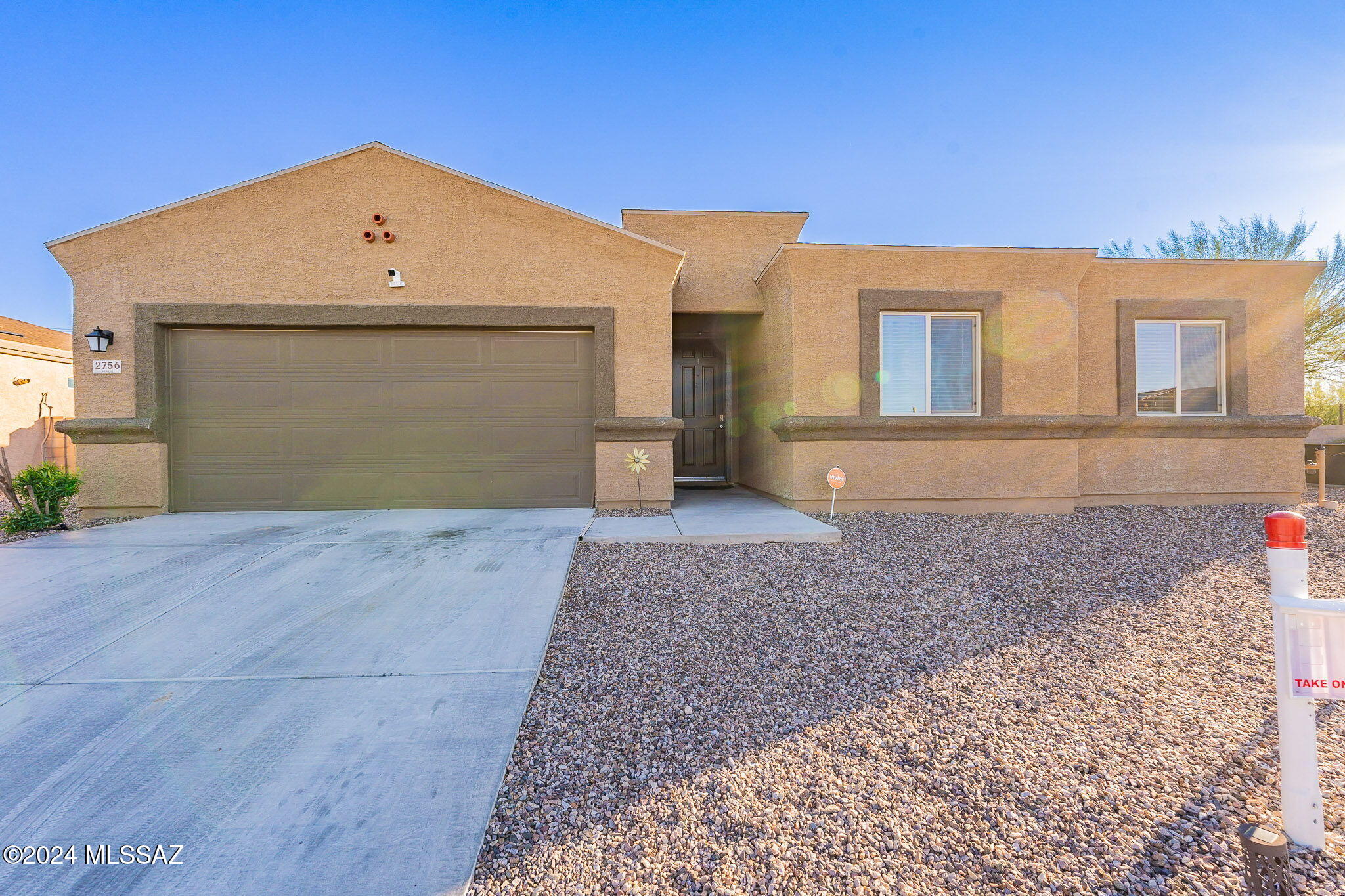 This modern 3-bed, 2-bath home in Tres Pueblos, built in 2020 by DR Horton, offers contemporary living with 9-foot ceilings and an open floor plan. Situated on a premium corner lot with wide side yards and an RV gate. The home features upgraded finishes including espresso cabinetry, granite counters, and a 5-burner stove. Enjoy stainless-steel appliances, large format tile flooring, and sleek 5-panel doors. The backyard is an entertainer's dream with an extended full-length covered patio, built-in grill, and a built-in gazebo. This single-story home blends style and function in a desirable location.