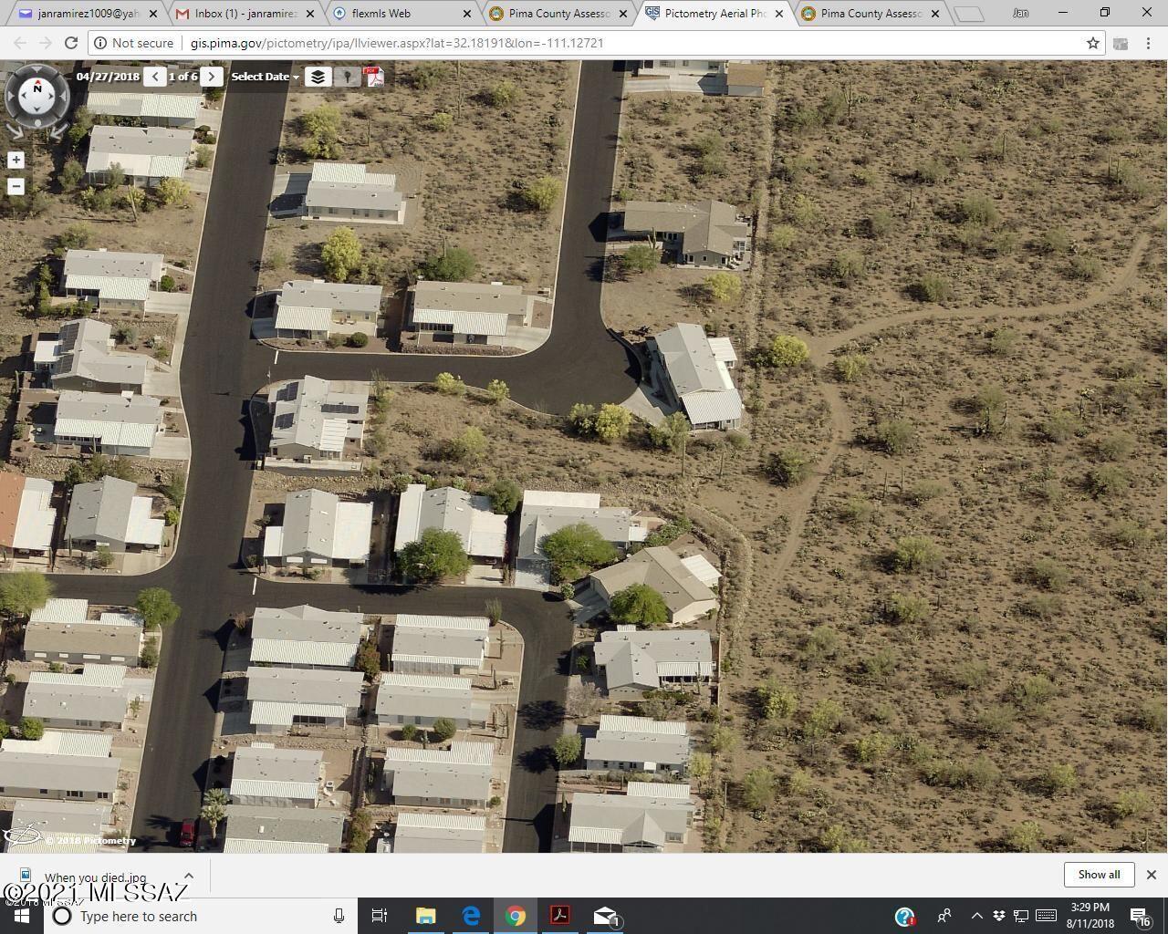 Beautiful building lot has been surveyed and staked in preparation for construction of a new manufactured home.  Seller owns two adjacent lots, this one and the one to the west, and had planned a home to be constructed across both lots with a large garage. Circumstances have changed so they are not able to complete their plan. Application has been sent to combine the lots to one parcel. If  a buyer chooses one lot, seller will file paperwork to split the two lots exactly as they were.  The location has a beautiful view of the mountains, a home set on these lots will be spectacular.  Go ahead and walk the lots.