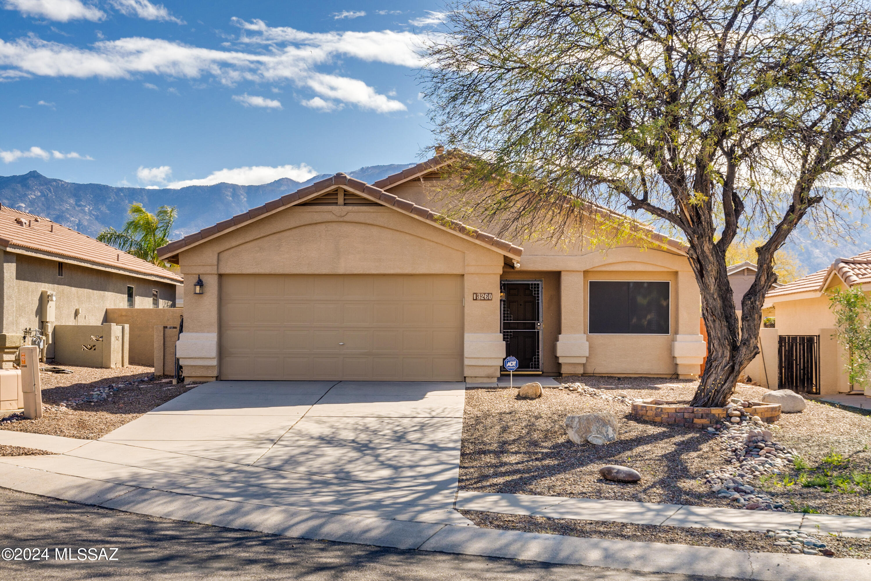 Welcome to your dream home in desirable Rancho Vistoso community. This immaculately maintained cul-de-sac property offers stunning views of Pusch Ridge from the backyard patio & pool area. With 4 bedrooms & 2 baths, this home features vaulted ceilings, ss appliances, ceramic tile floors, & updated lighting fixtures throughout. Step outside to your private oasis & relax on the covered patio after taking a refreshing dip in the sparkling pool & spa. Enjoy low maintenance landscaping & take advantage of the 2 car garage for added convenience. Located in a quiet neighborhood, this home offers the perfect blend of tranquility & convenience. Minutes away from Market Place Mall, grocery shopping, banks, restaurants, & more. Don't miss an opportunity to call this stunning property your new home!