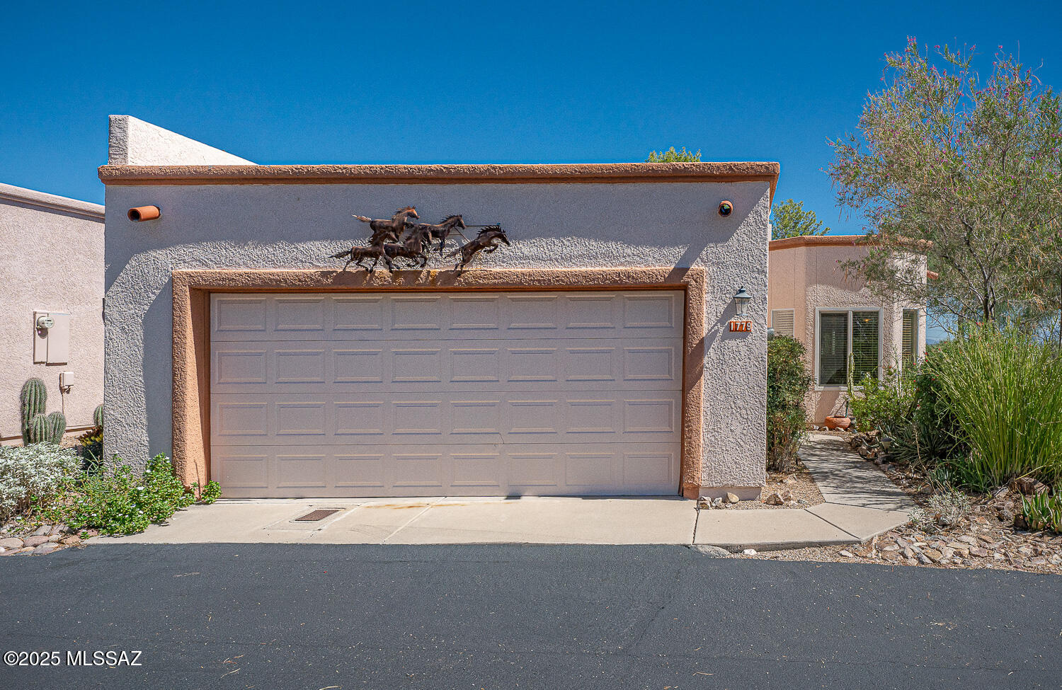 This spacious (1615 sf) end unit Dorn townhouse with clerestory windows and skylights completely remodeled in 2022! Kitchen with new composite sink, quartz counters, slate backsplash, new black stainless appliances, lighting, tile floor & new window. Main bath updated with new vanity, quartz counter, fixtures, mirror, toilet, new tile shower, and lighting. Guest room got LVP flooring, new lighting/fan. Guest bath updated with quartz counter, vanity, mirror, toilet, fixtures & shower head, Main bedroom & office got new lighting & fans.  New fan & chandelier grace the great room. Fireplace refaced with natural slate tile and beautiful wood mantel. All new window treatments! New hot water tank & new pergola in 2022. Located on a quiet street. Priced to sell! Owner is licensed AZ Realtor.